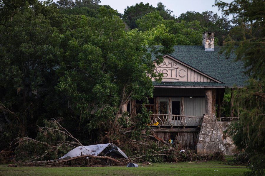 FILE - Debris covers the area of Camp Mystic in Hunt, Texas, Monday, July 7, 2025, after a flash flood swept through the area. (AP Photo/Eli Hartman, File)