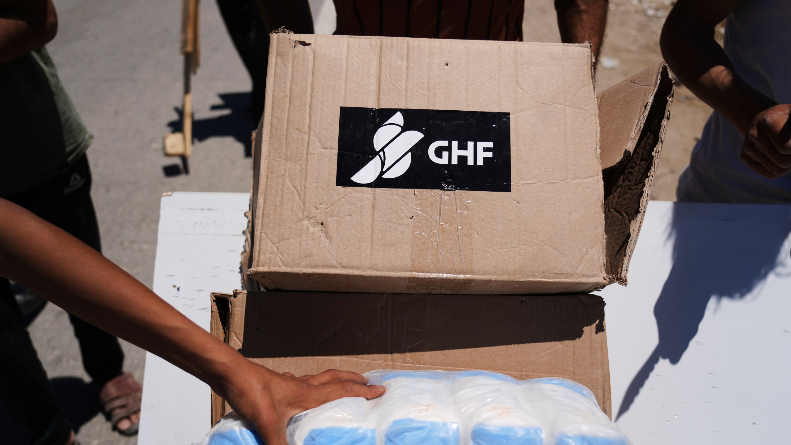 FILE - Boxes and bags of humanitarian aid delivered by the Gaza Humanitarian Foundation, a U.S.-backed organization approved by Israel, are seen in Khan Younis, southern Gaza Strip, on May 29, 2025. (AP Photo/Abdel Kareem Hana, File)