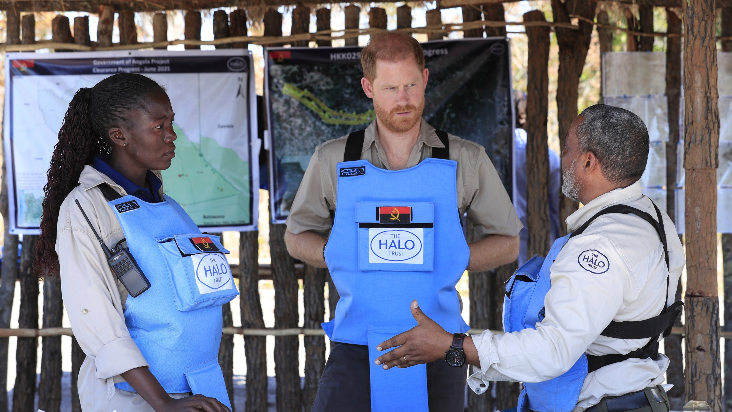 Britain's Prince Harry listens during a visit to see the work of landmine clearance charity of the Halo Trust, in Cuito Cuanavale, Cuando province, southern Angola, Wednesday, July 16, 2025. (Ampe Pedro/The Halo Trust via AP)