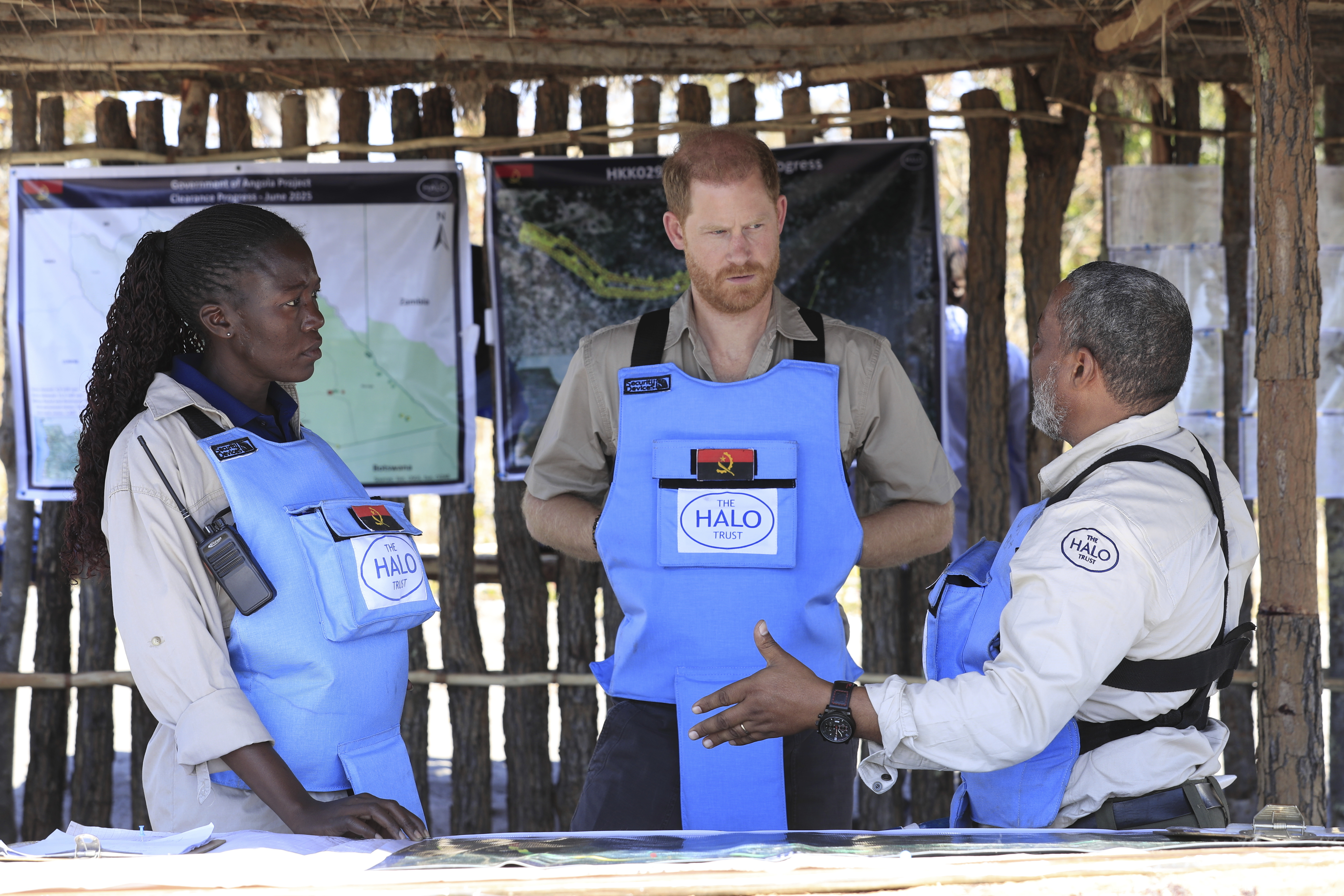 Britain's Prince Harry listens during a visit to see the work of landmine clearance charity of the Halo Trust, in Cuito Cuanavale, Cuando province, southern Angola, Wednesday, July 16, 2025. (Ampe Pedro/The Halo Trust via AP)