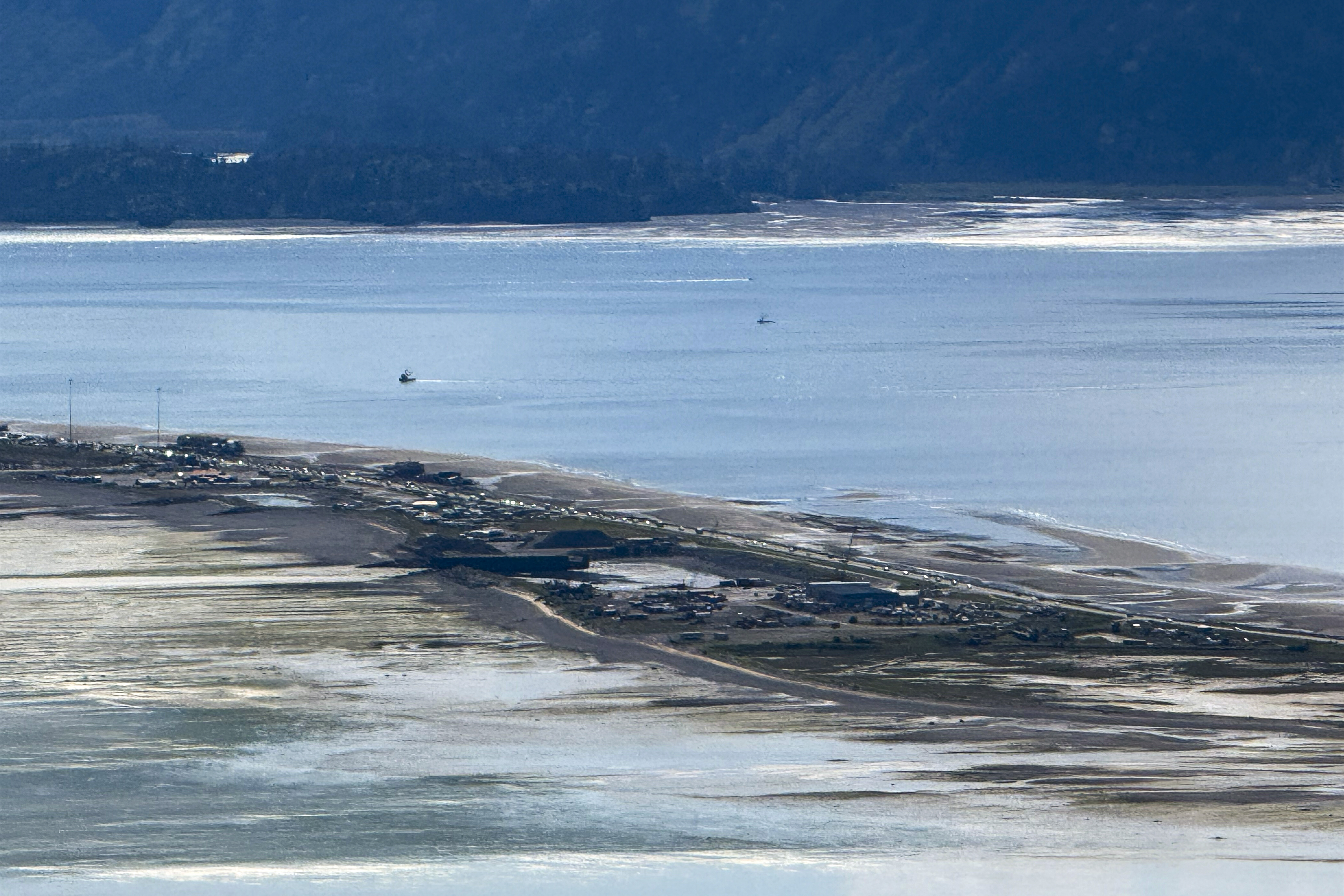 In this image provided by Tim Hatfield, cars leave Homer Spit on Wednesday, July 16, 2025, in Homer, Alaska. (Tim Hatfield via AP)