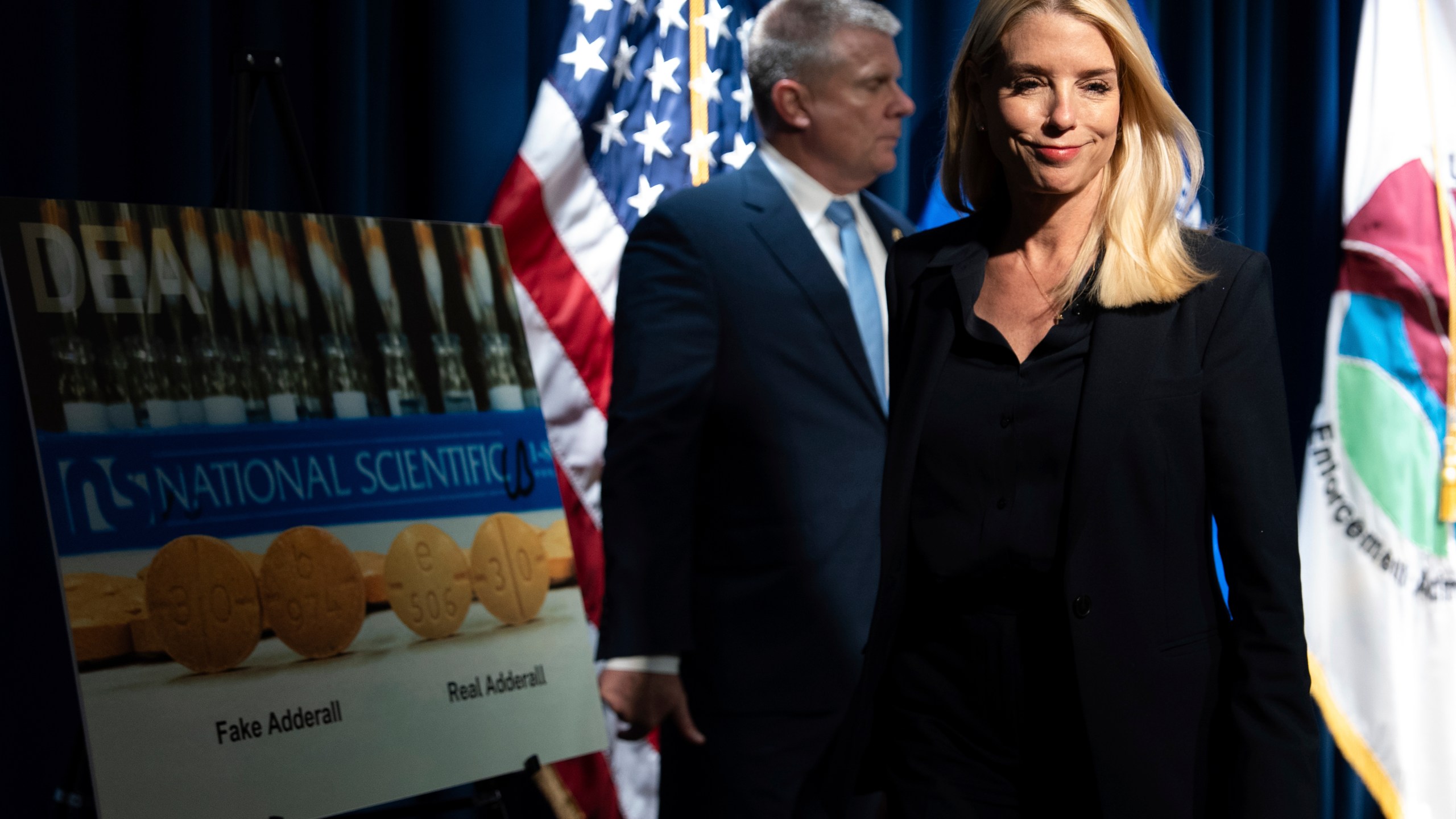 Attorney General Pam Bondi leaves following a news conference at the Drug Enforcement Administration, Tuesday, July 15, 2025, in Arlington, Va. (AP Photo/Julia Demaree Nikhinson)