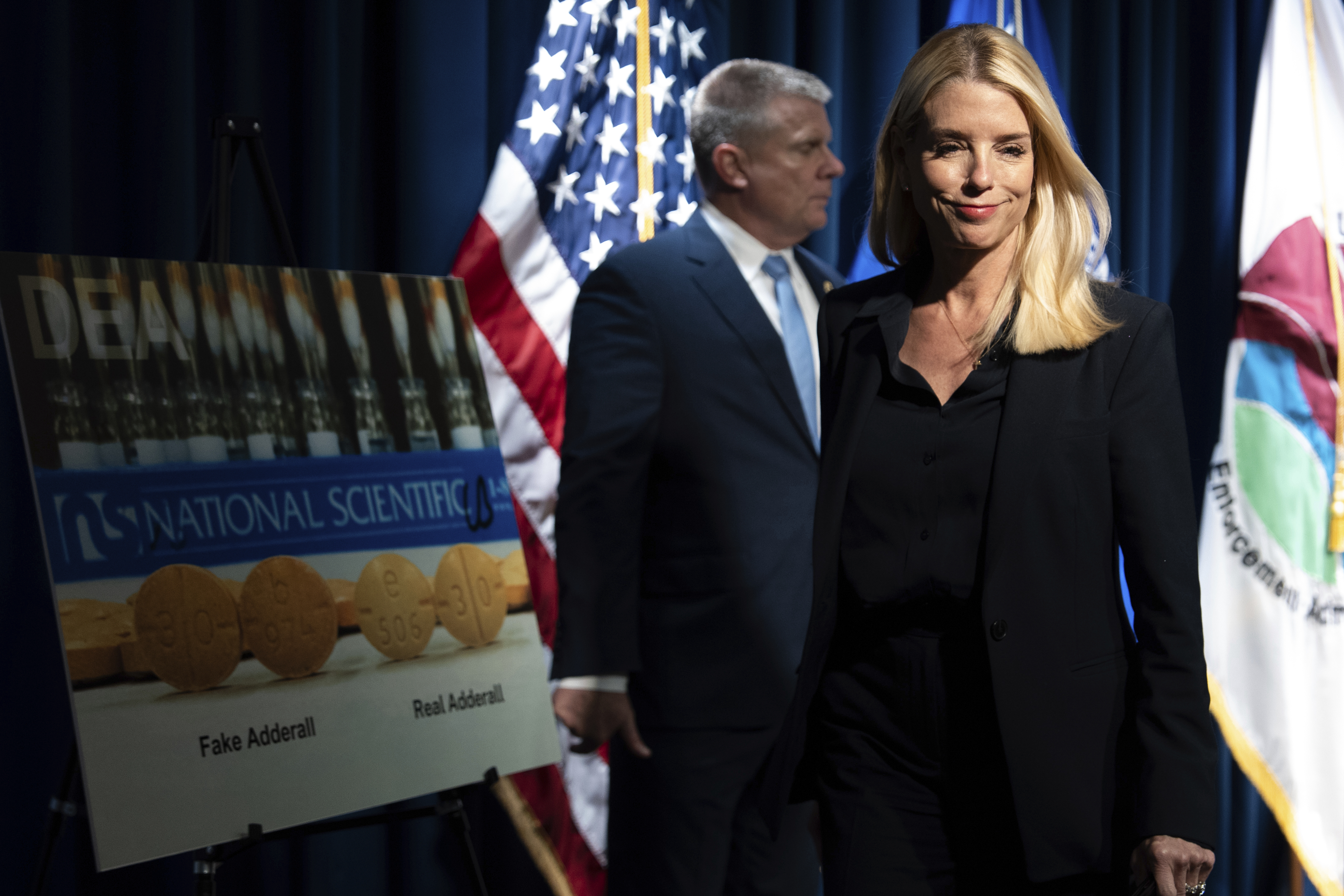 Attorney General Pam Bondi leaves following a news conference at the Drug Enforcement Administration, Tuesday, July 15, 2025, in Arlington, Va. (AP Photo/Julia Demaree Nikhinson)
