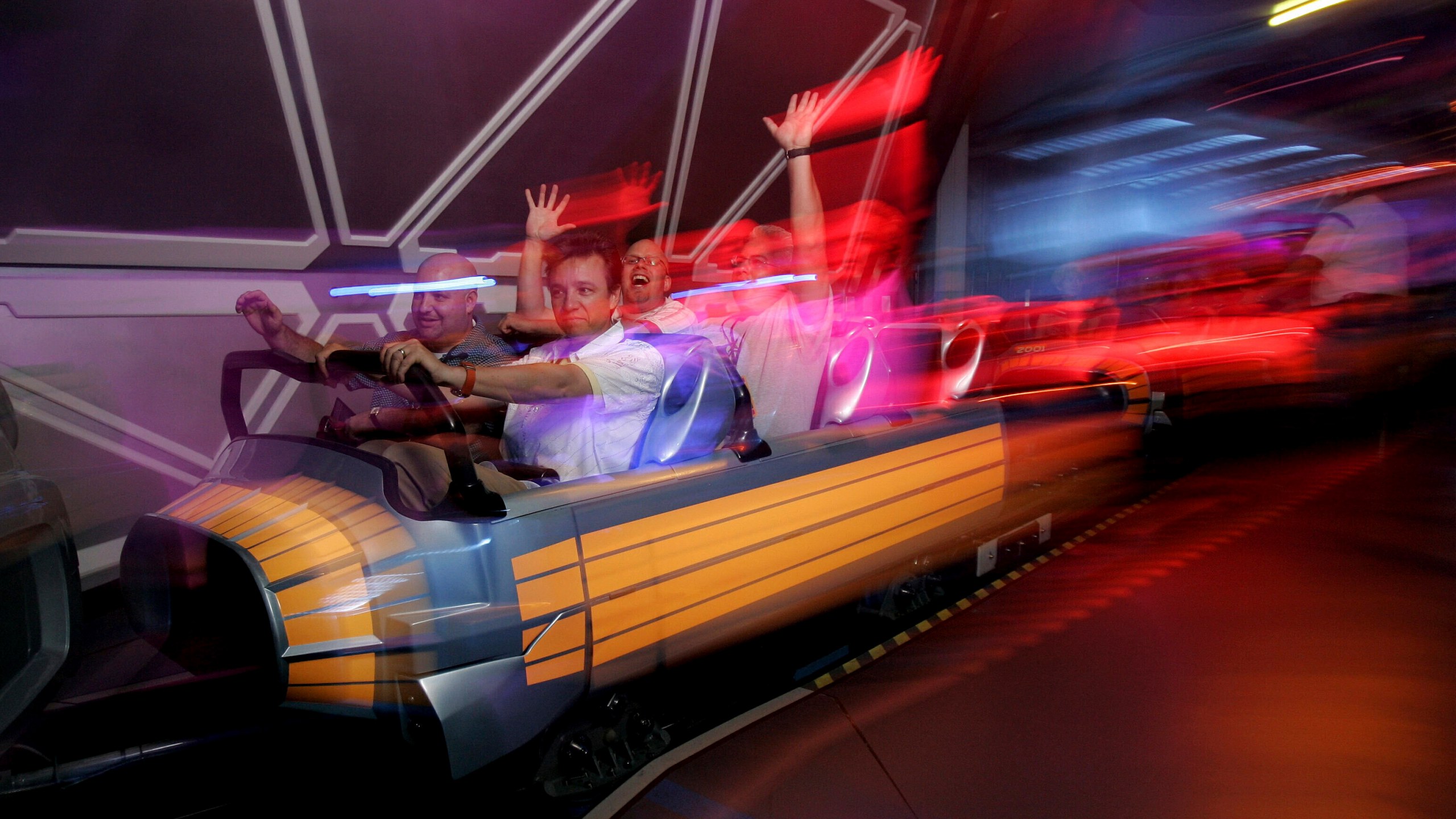 FILE - Guests ride Disneyland's "Space Mountain" attraction in Anaheim, Calif., July 15, 2005. (AP Photo/Kevork Djansezian, File)
