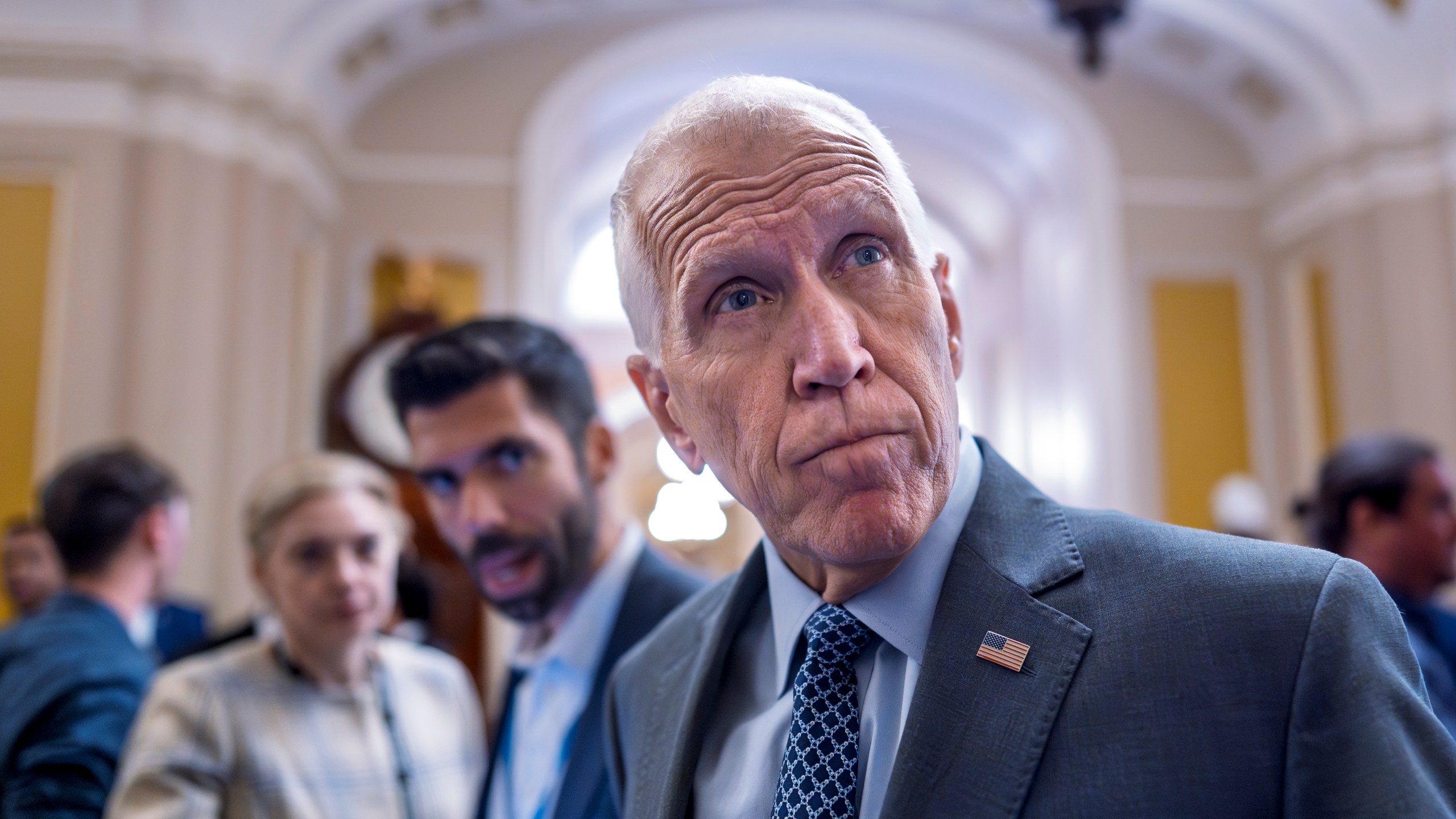 Sen. Thom Tillis, R-N.C., a member of the Senate Banking Committee, tells reporters that it would be a mistake for President Donald Trump to fire Federal Reserve Chair Jerome Powell, during a vote in the Senate, at the Capitol in Washington, Wednesday, July 16, 2025. (AP Photo/J. Scott Applewhite)