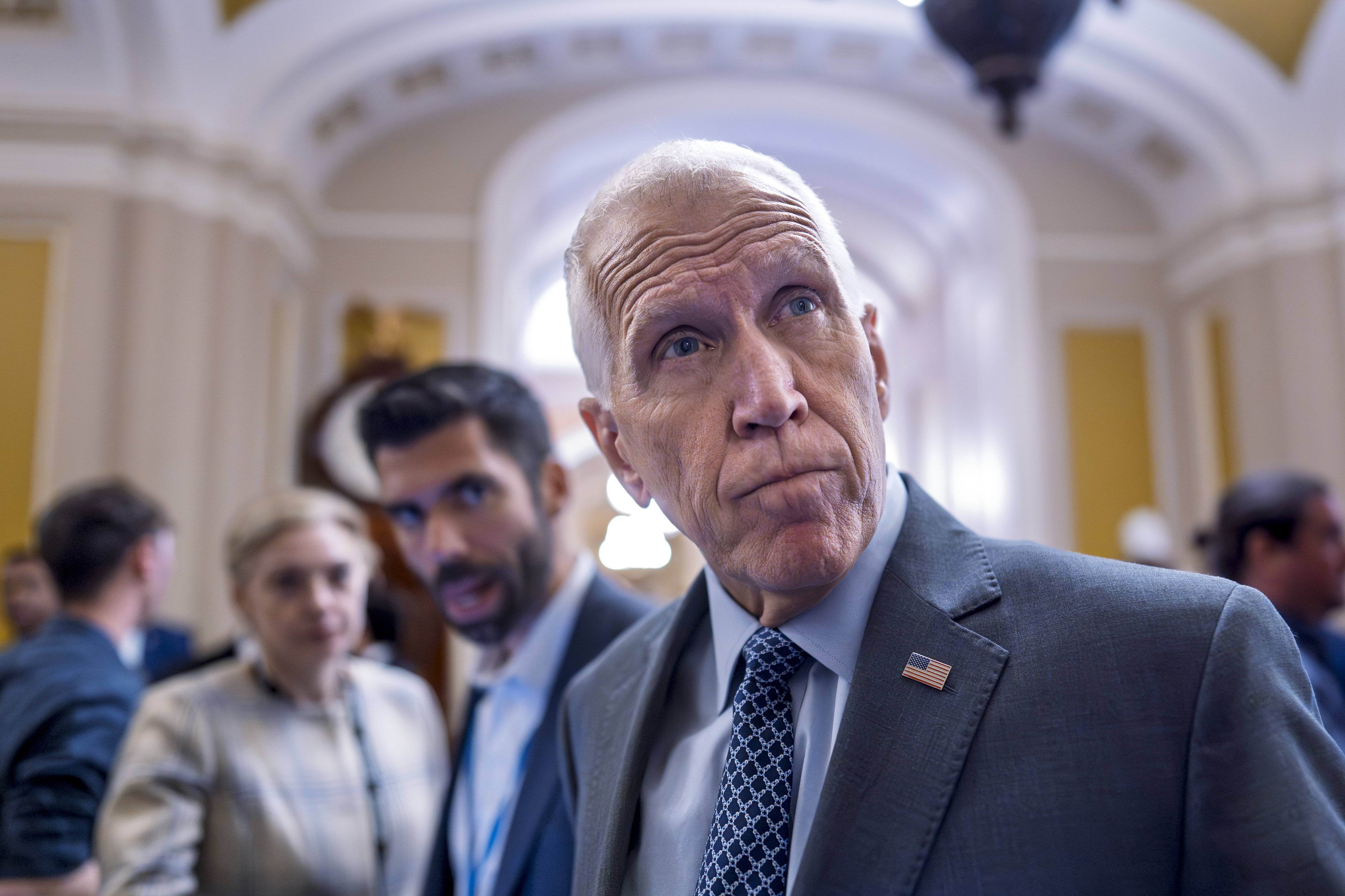 Sen. Thom Tillis, R-N.C., a member of the Senate Banking Committee, tells reporters that it would be a mistake for President Donald Trump to fire Federal Reserve Chair Jerome Powell, during a vote in the Senate, at the Capitol in Washington, Wednesday, July 16, 2025. (AP Photo/J. Scott Applewhite)