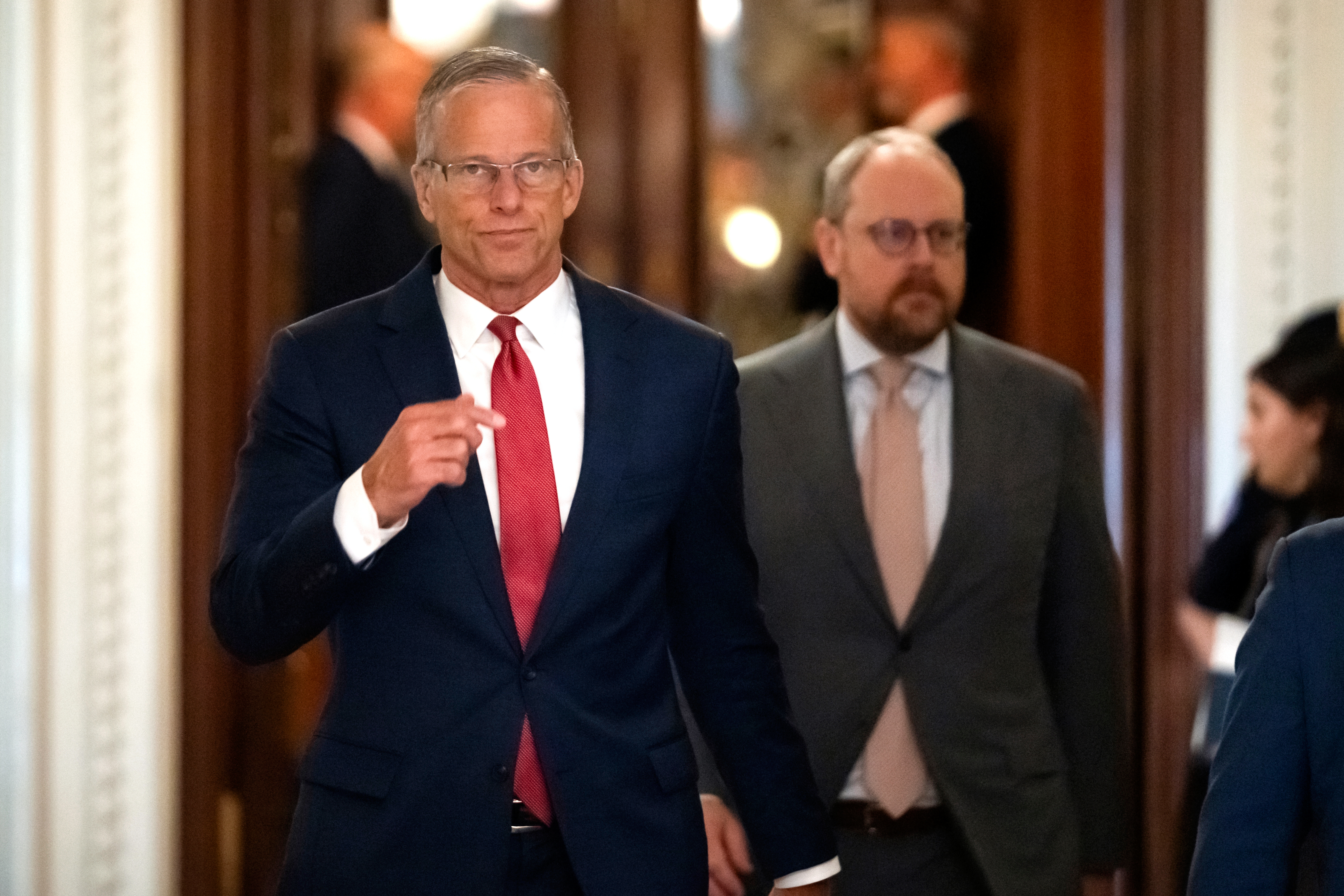 Senate Majority Leader John Thune, of S.D., walks toward his office from the Senate chamber at the Capitol, Wednesday, July 16, 2025, in Washington. (AP Photo/Mark Schiefelbein)