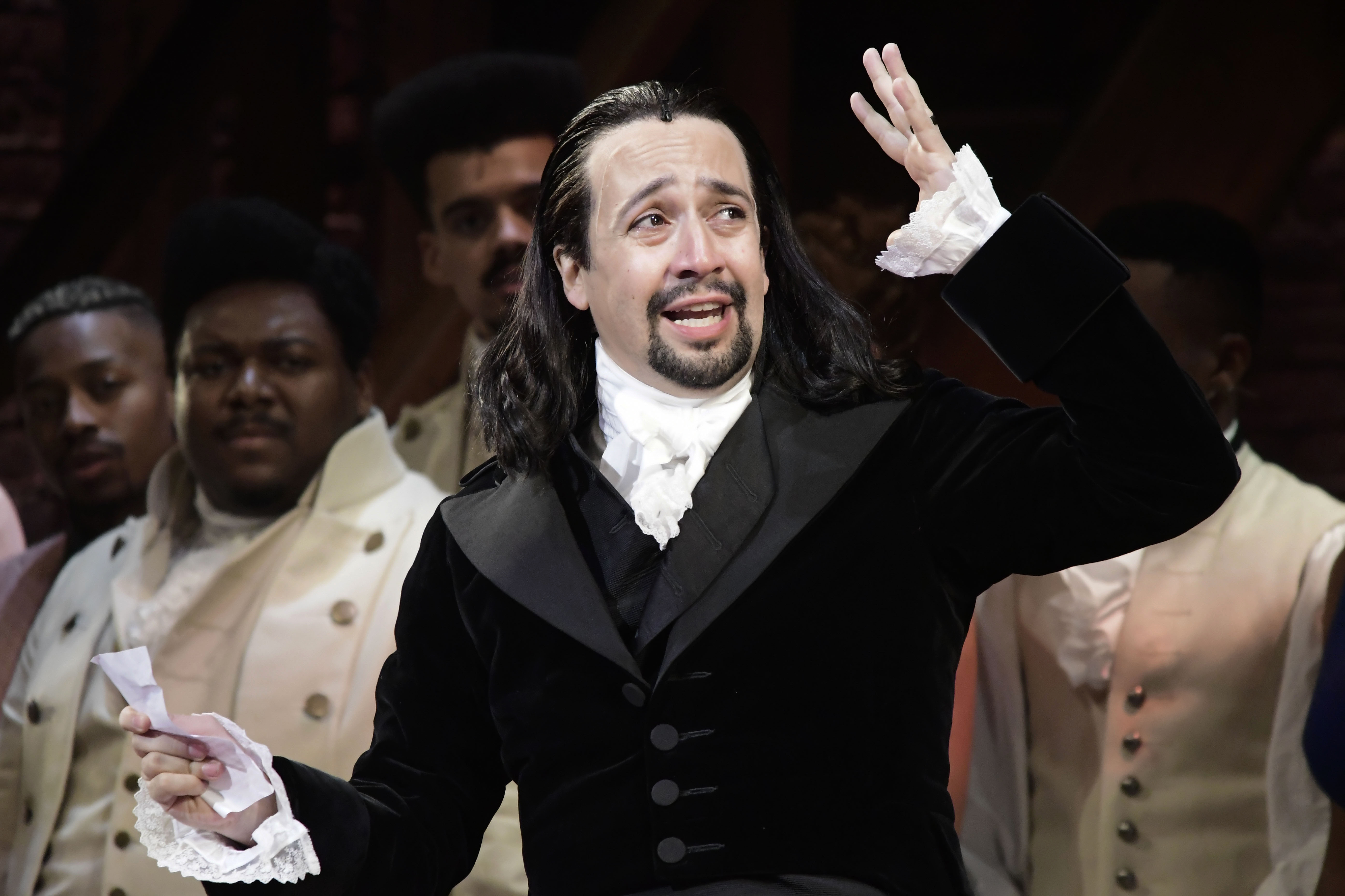 Lin-Manuel Miranda, composer and creator of the award-winning Broadway musical, Hamilton, offers a message of gratitude after receiving a standing ovation at the end of the play's premiere held at the Santurce Fine Arts Center, in San Juan, Puerto Rico, Jan. 11, 2019. (AP Photo/Carlos Giusti, file)