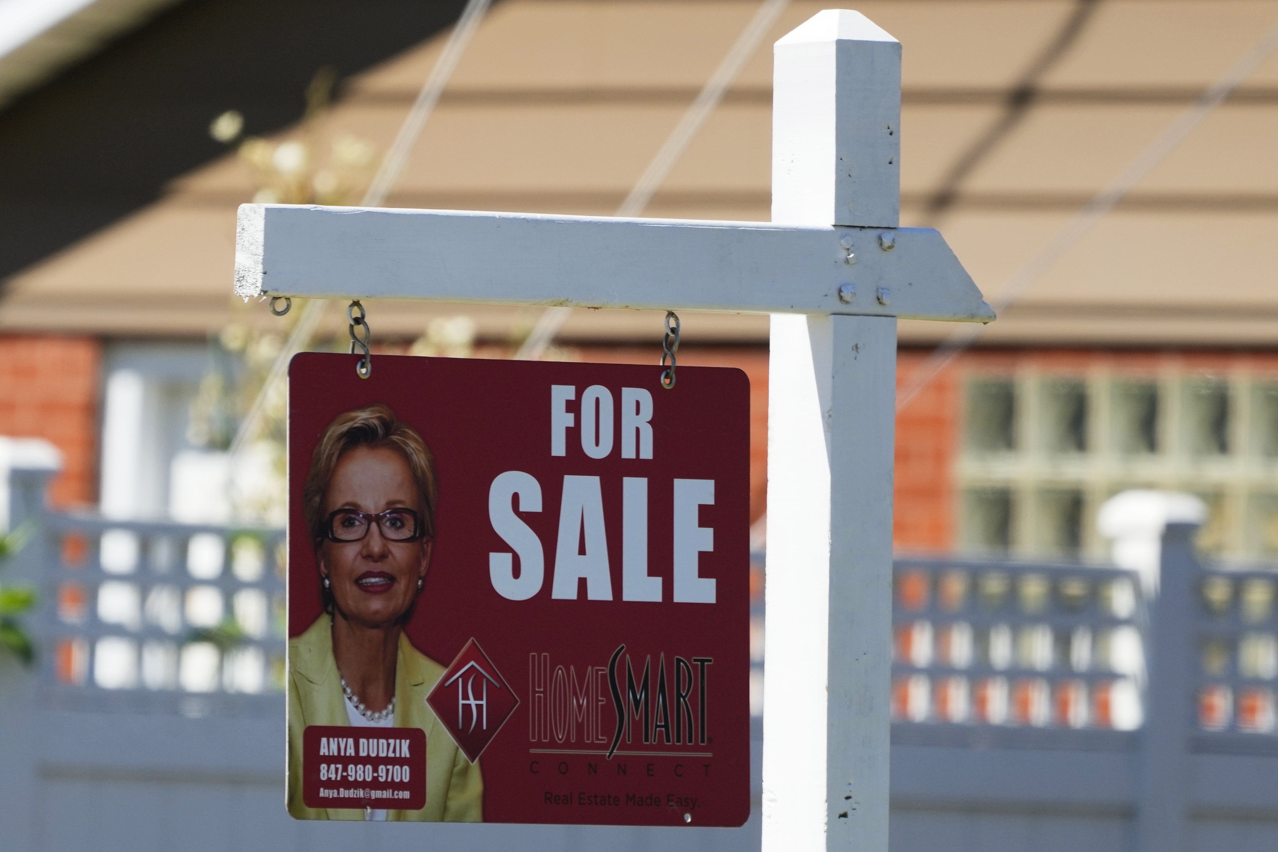FILE - A for sale sign stands outside a residence in Niles, Ill., July 1, 2024. (AP Photo/Nam Y. Huh, File)