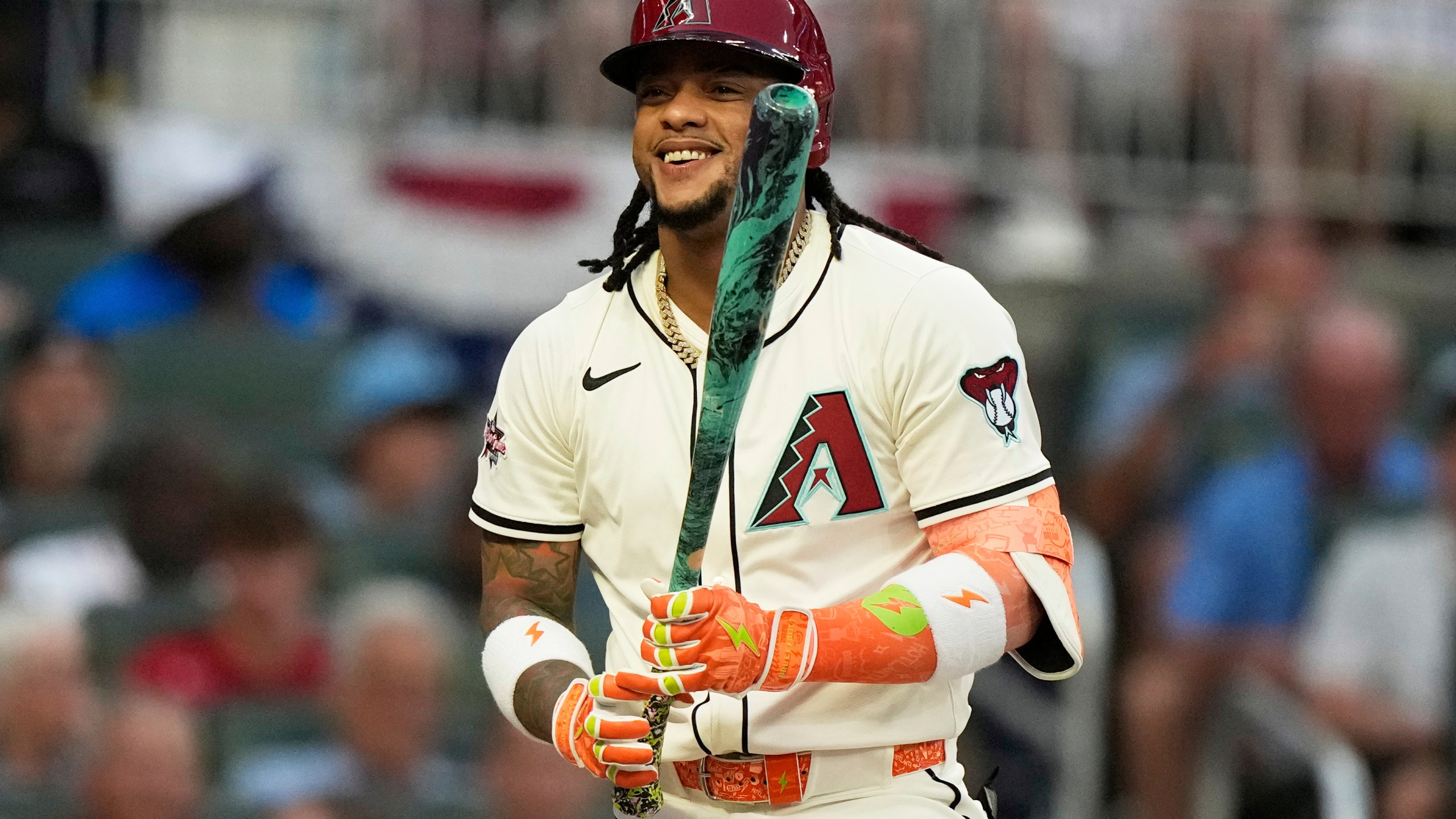 Arizona Diamondbacks' Ketel Marte smiles during first inning at the MLB baseball All-Star game between the American League and National League, Tuesday, July 15, 2025, in Atlanta. (AP Photo/Brynn Anderson)