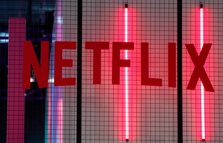FILE- In this Nov. 4, 2017, file photo, the logo of entertainment company Netflix is pictured in Paris. (AP Photo/Christophe Ena, File)