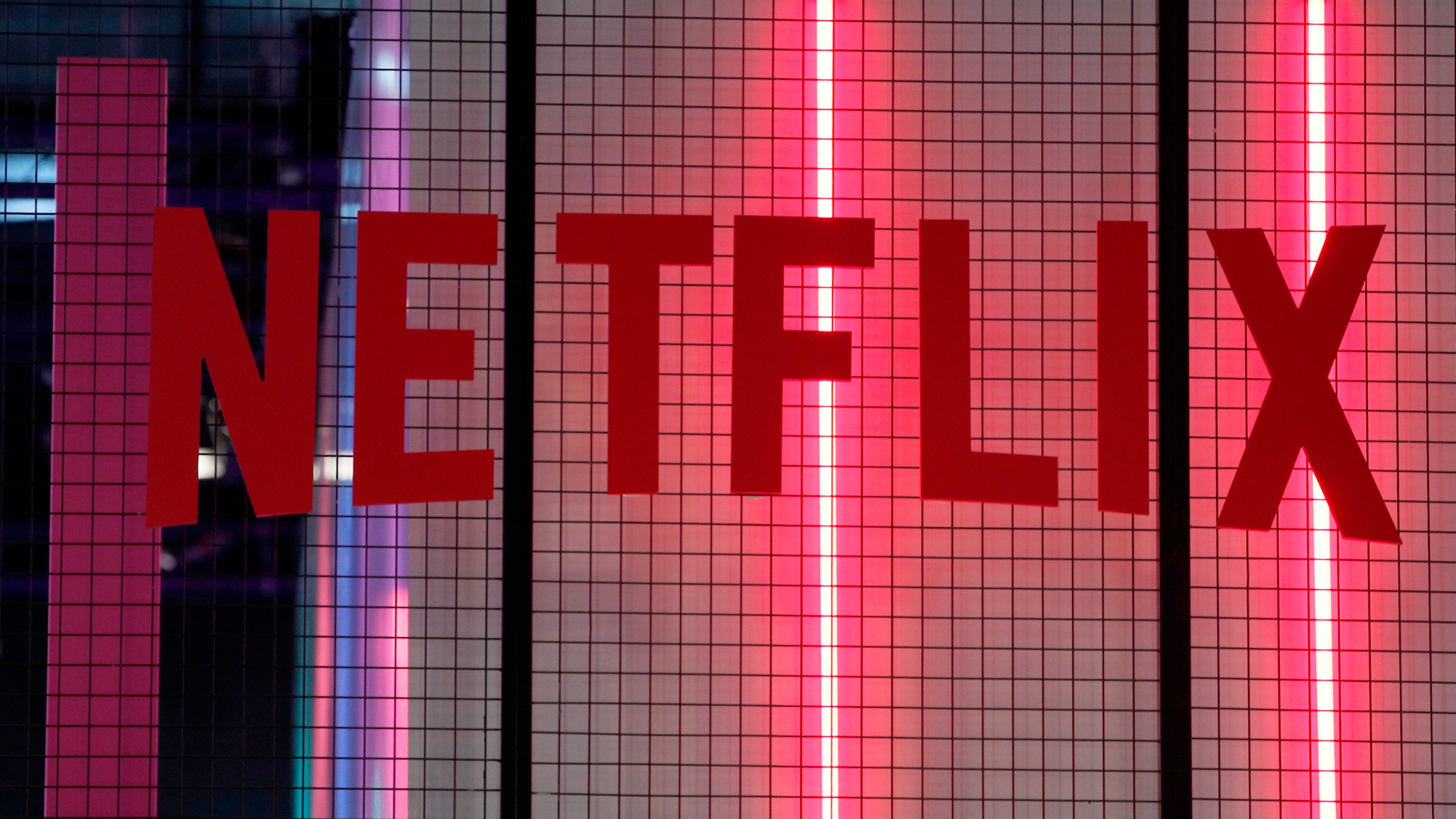FILE- In this Nov. 4, 2017, file photo, the logo of entertainment company Netflix is pictured in Paris. (AP Photo/Christophe Ena, File)