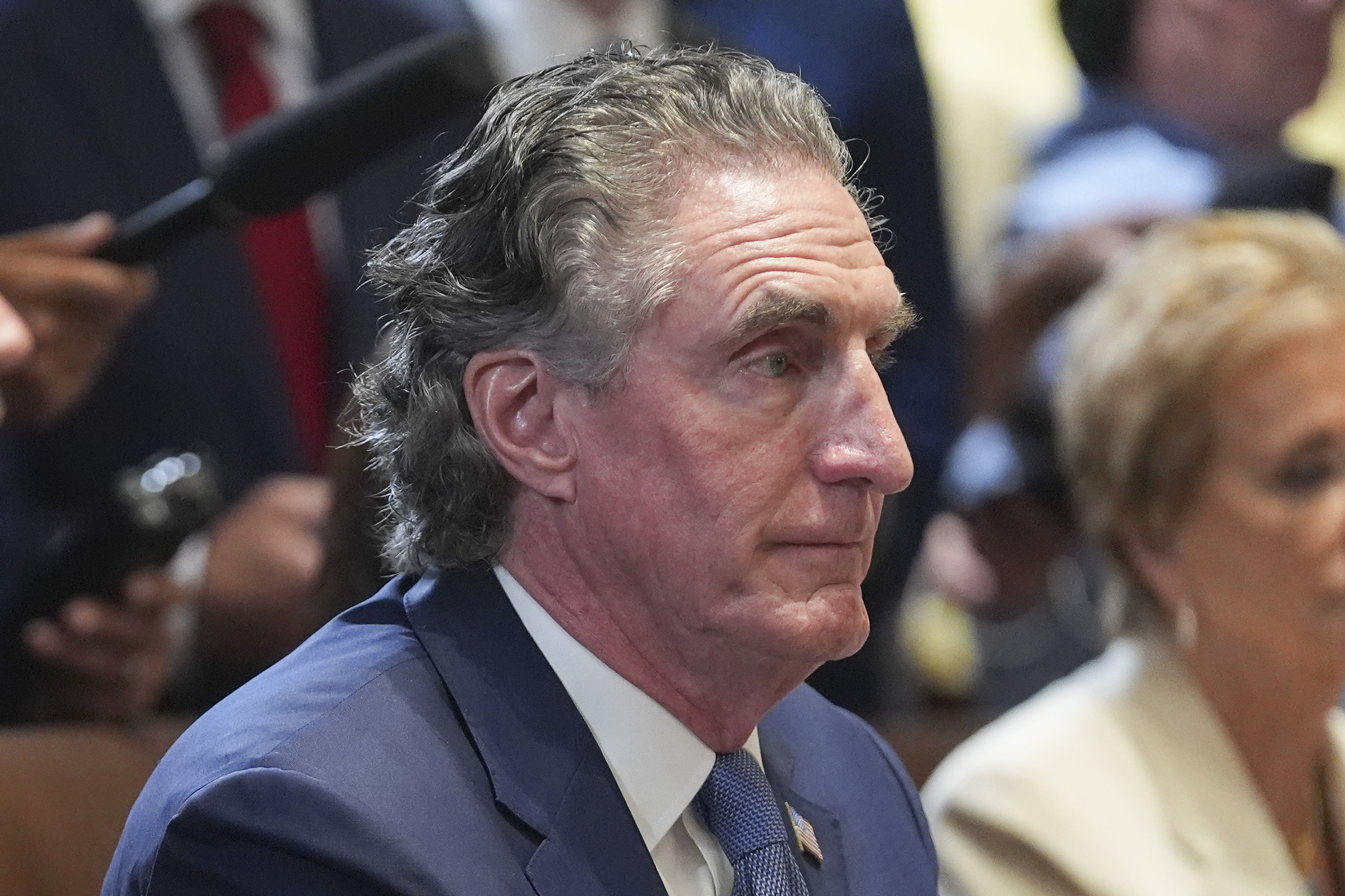 Secretary of Interior Doug Burgum listens to President Donald Trump speak during a cabinet meeting at the White House, Tuesday, July 8, 2025, in Washington. (AP Photo/Evan Vucci)