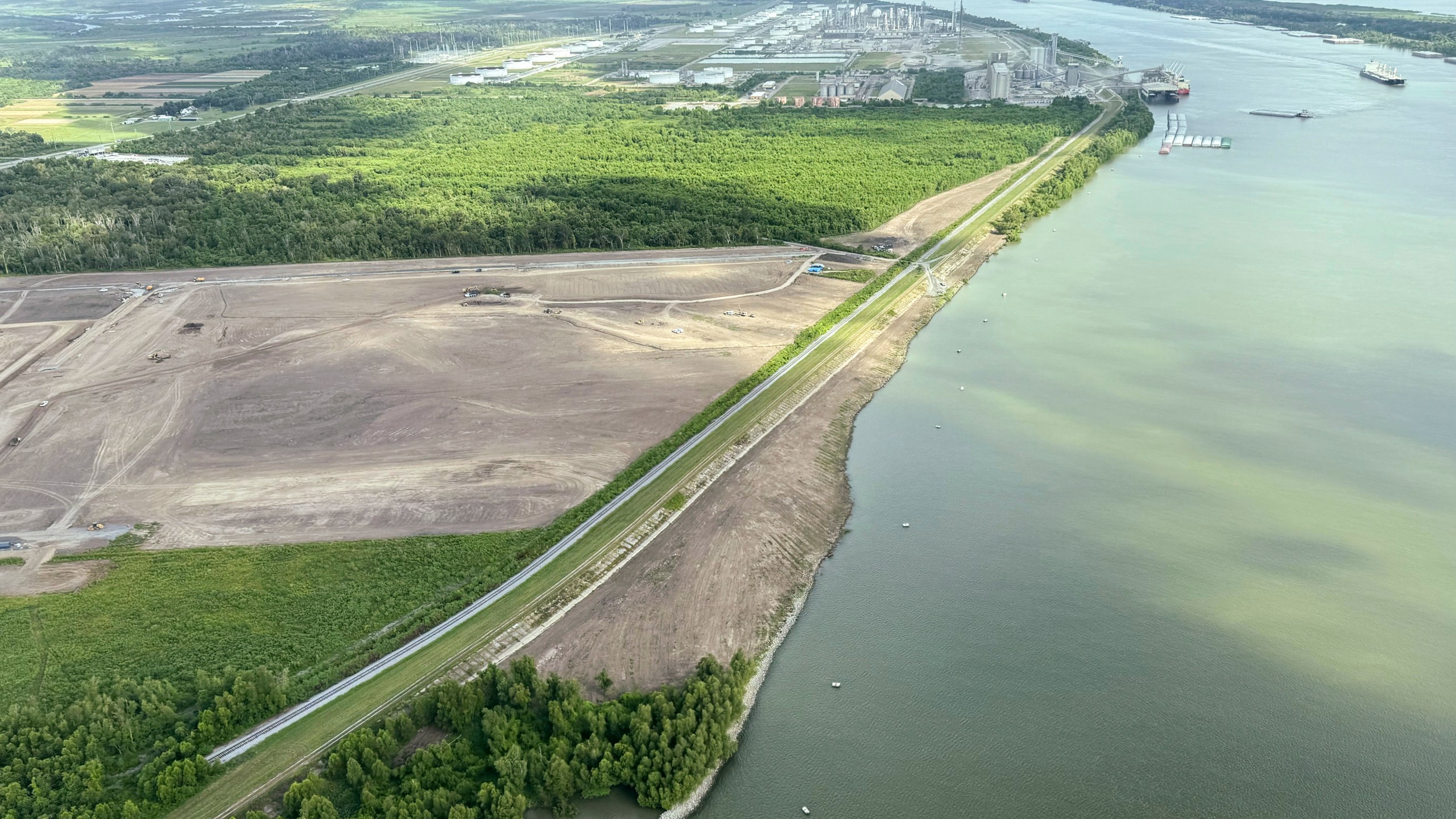 FILE - The nearly $3 billion Mid-Barataria Sediment Diversion project along the Mississippi River, intended to stave off coastal land loss in southeastern Louisiana, is seen during a flyover with the environmental coalition group Restore the Mississippi River Delta, Aug. 29, 2024. (AP Photo/Jack Brook, File)