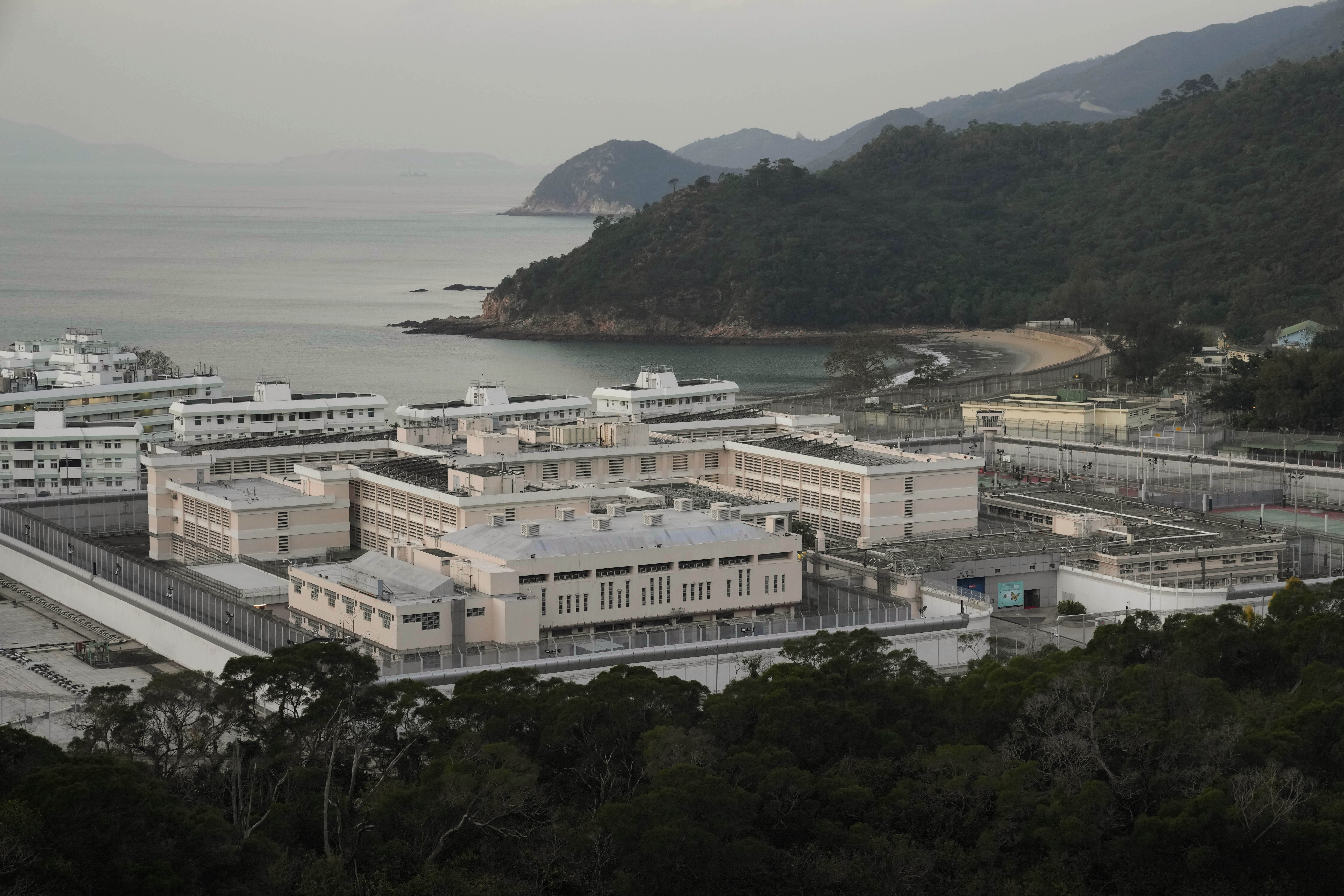 FILE -Exterior view of Shek Pik Prison is seen in Hong Kong, Jan. 19, 2022. (AP Photo/Kin Cheung), File)