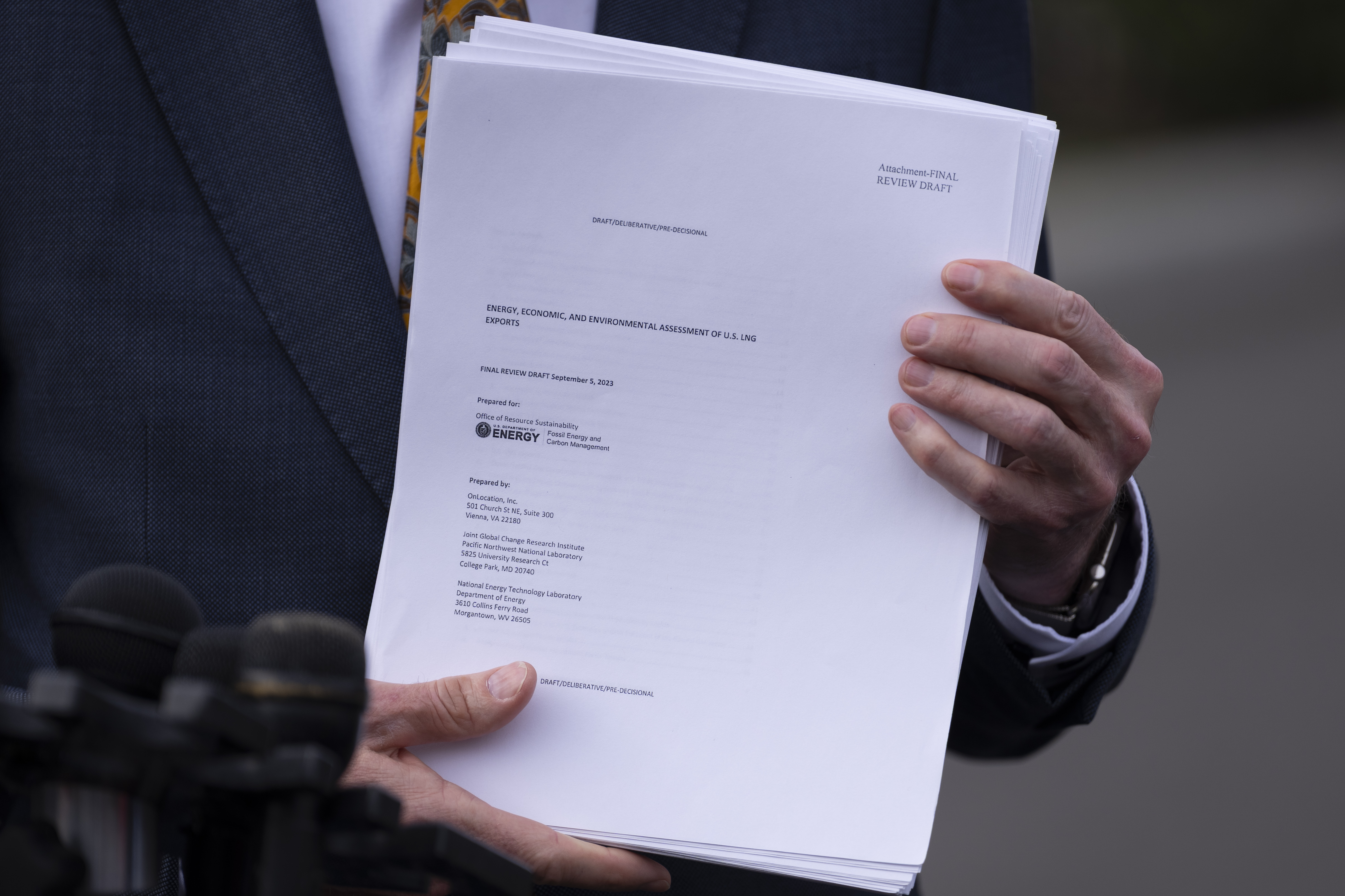 FILEL - Energy Secretary Chris Wright holds a report concerning U.S. exports of liquefied natural gas (LNG) as he speaks to reporters at the White House in Washington, on March 19, 2025. (AP Photo/Ben Curtis, File)