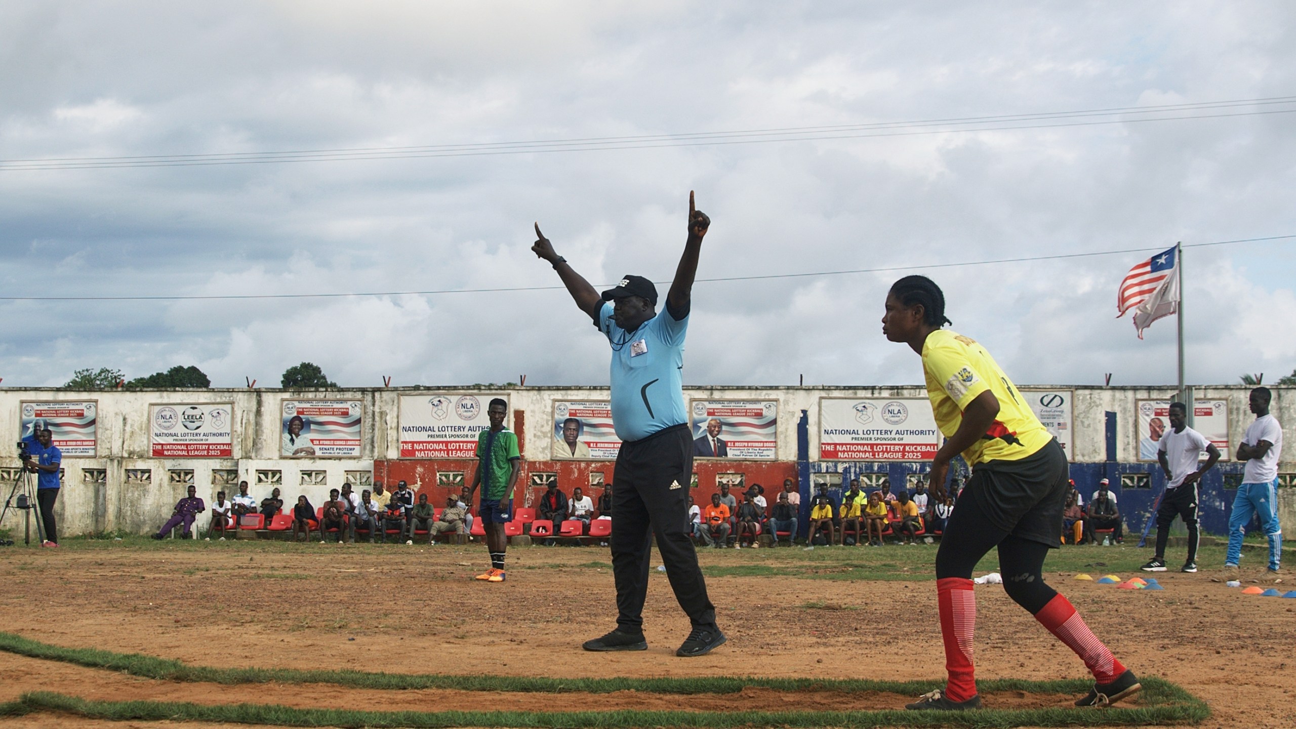 A kickball player prepares to kick the ball during a match at the Samuel Kanyon Doe Stadium in Monrovia, Liberia, June 14, 2025. (AP Photo/Annie Risemberg)