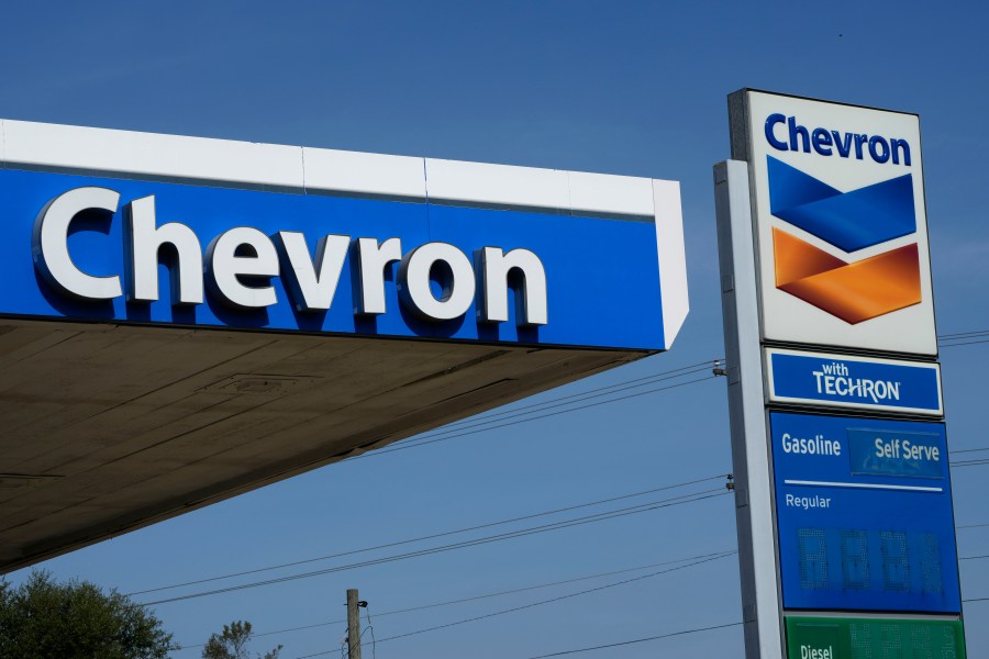 File - Chevron logos are displayed at a gas station in Columbus, Miss., Monday, Oct. 23, 2023.(AP Photo/Rogelio V. Solis, File)