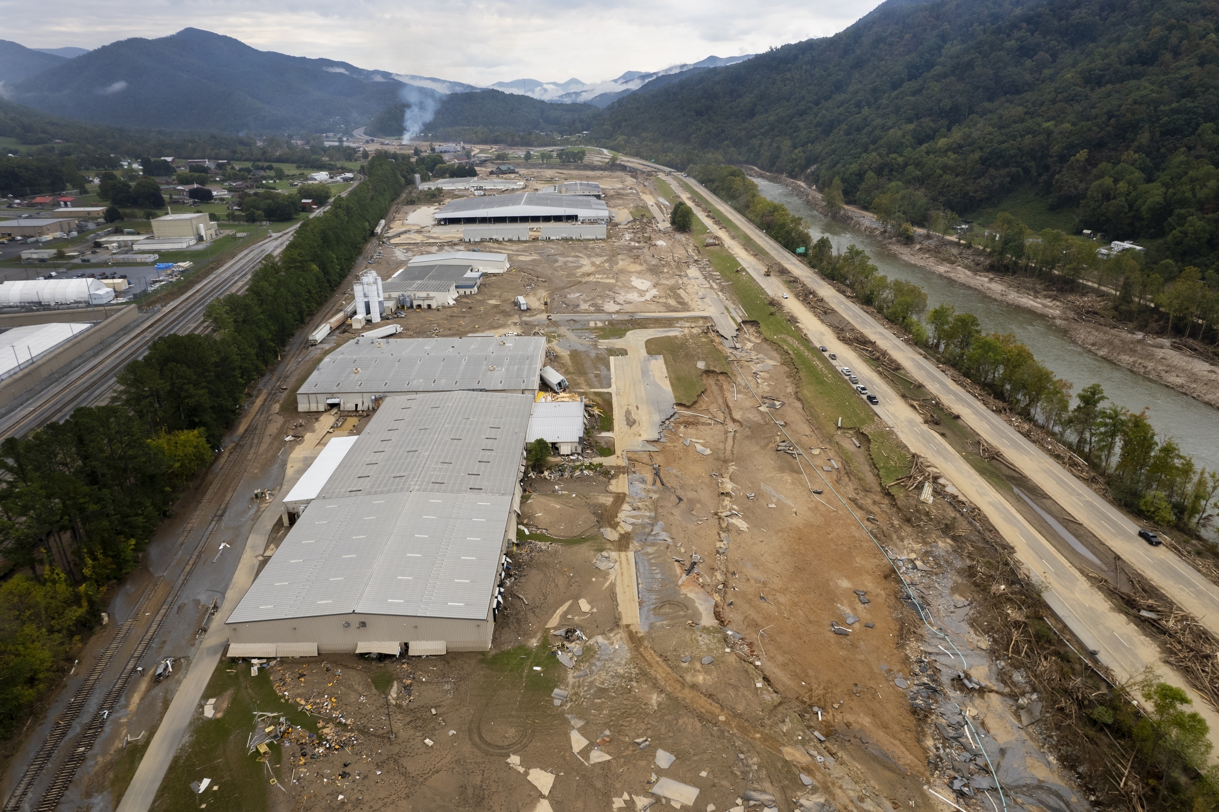 FILE - The area around Impact Plastics Inc. is damaged from flooding during Hurricane Helene in Erwin, Tenn., Oct. 4, 2024. (AP Photo/Jeff Roberson, File)