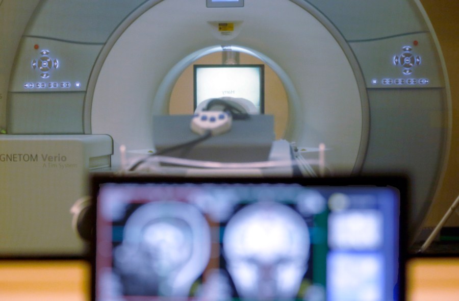 FILE - A brain-scanning MRI machine is seen in Pittsburgh, Nov. 26, 2014. (AP Photo/Keith Srakocic, File)