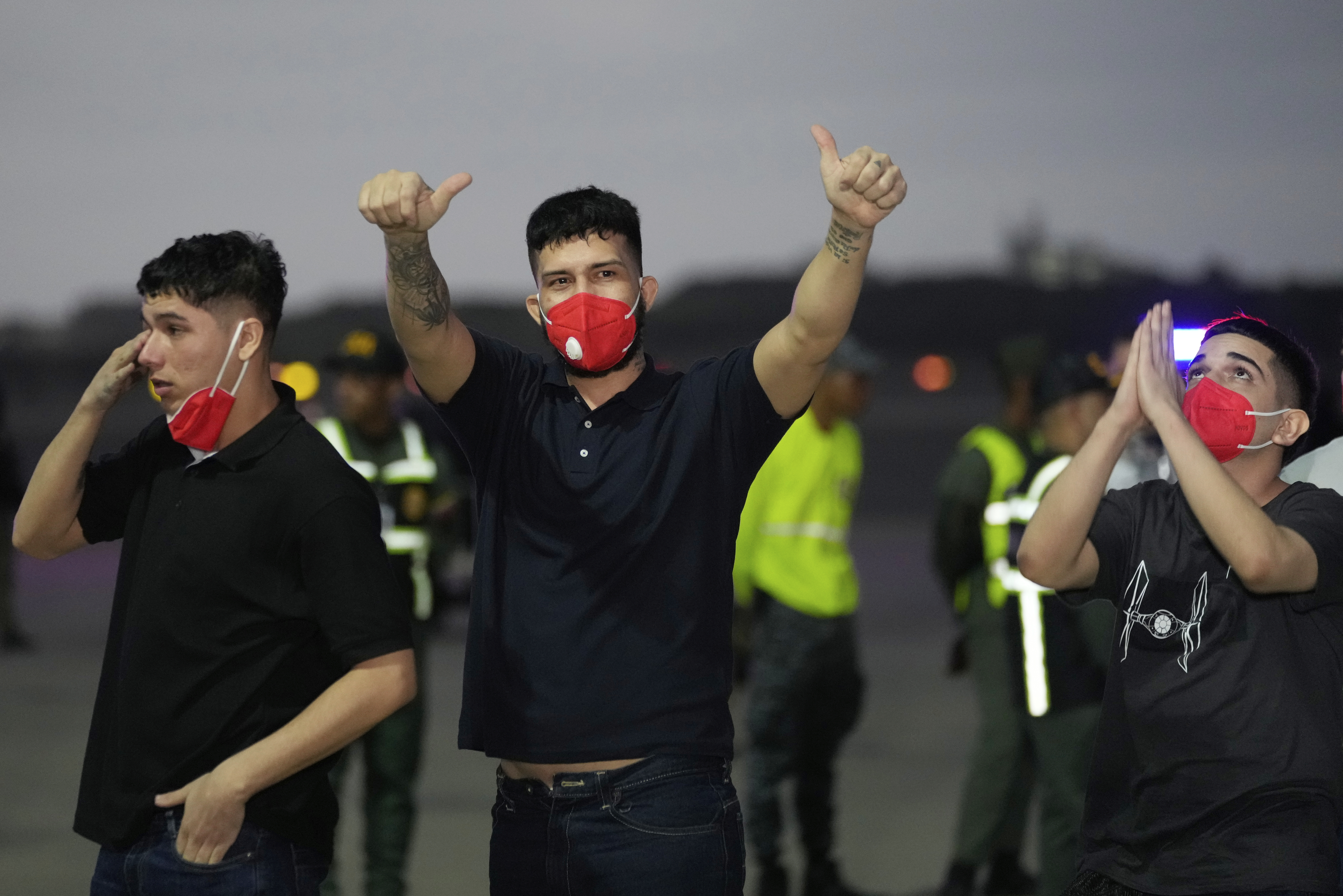 Migrants deported months ago by the United States to El Salvador under the Trump administration's immigration crackdown arrive at Simon Bolívar International Airport in Maiquetia, Venezuela, Friday, July 18, 2025. (AP Photo/Ariana Cubillos)
