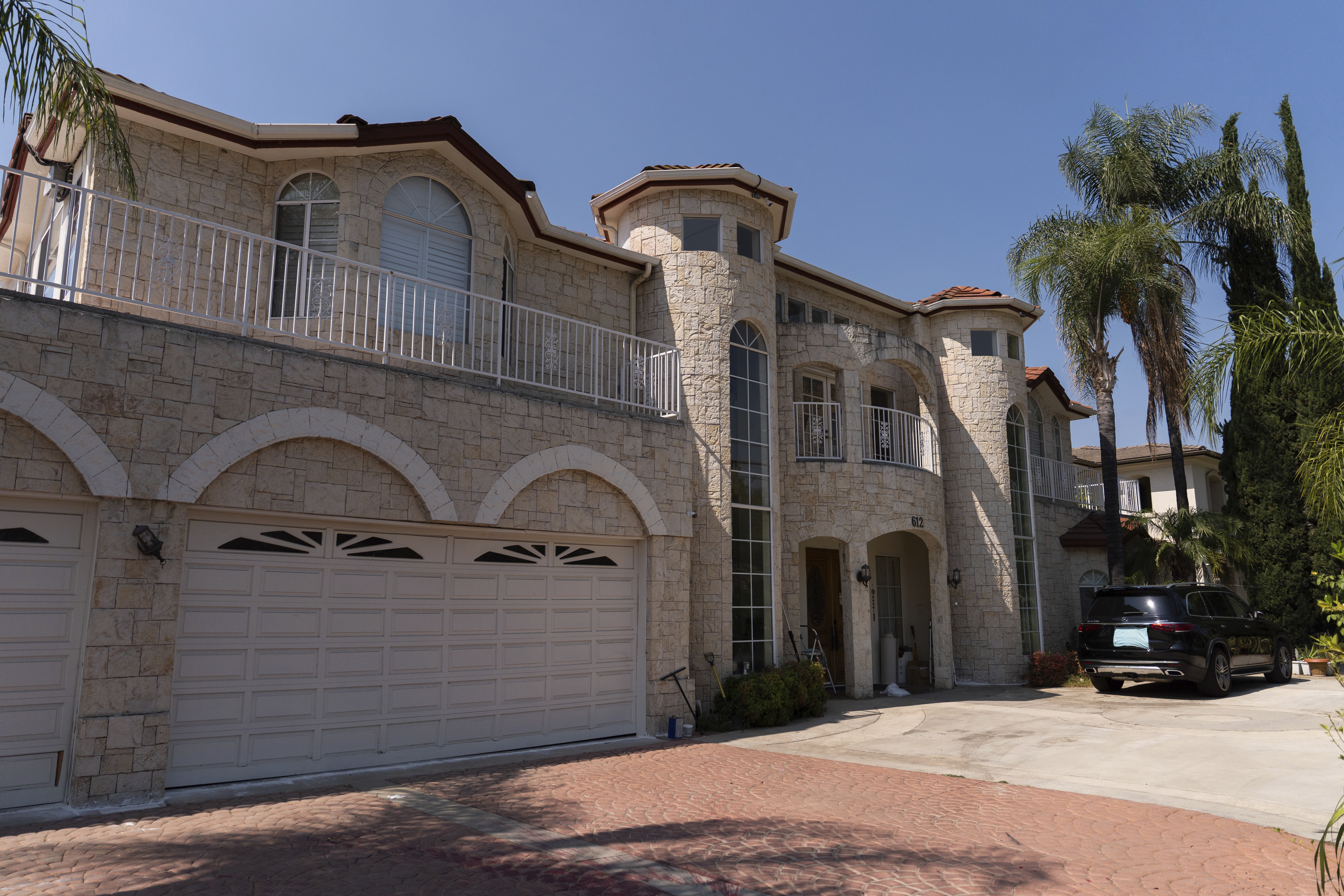 The home of Silvia Zhang and Guojun Xuan is seen on Wednesday, July 16, 2025, in Arcadia, Calif., where a number of children were removed from the couple's home after a child abuse allegation in May, according to Arcadia police. (AP Photo/Jae C. Hong)