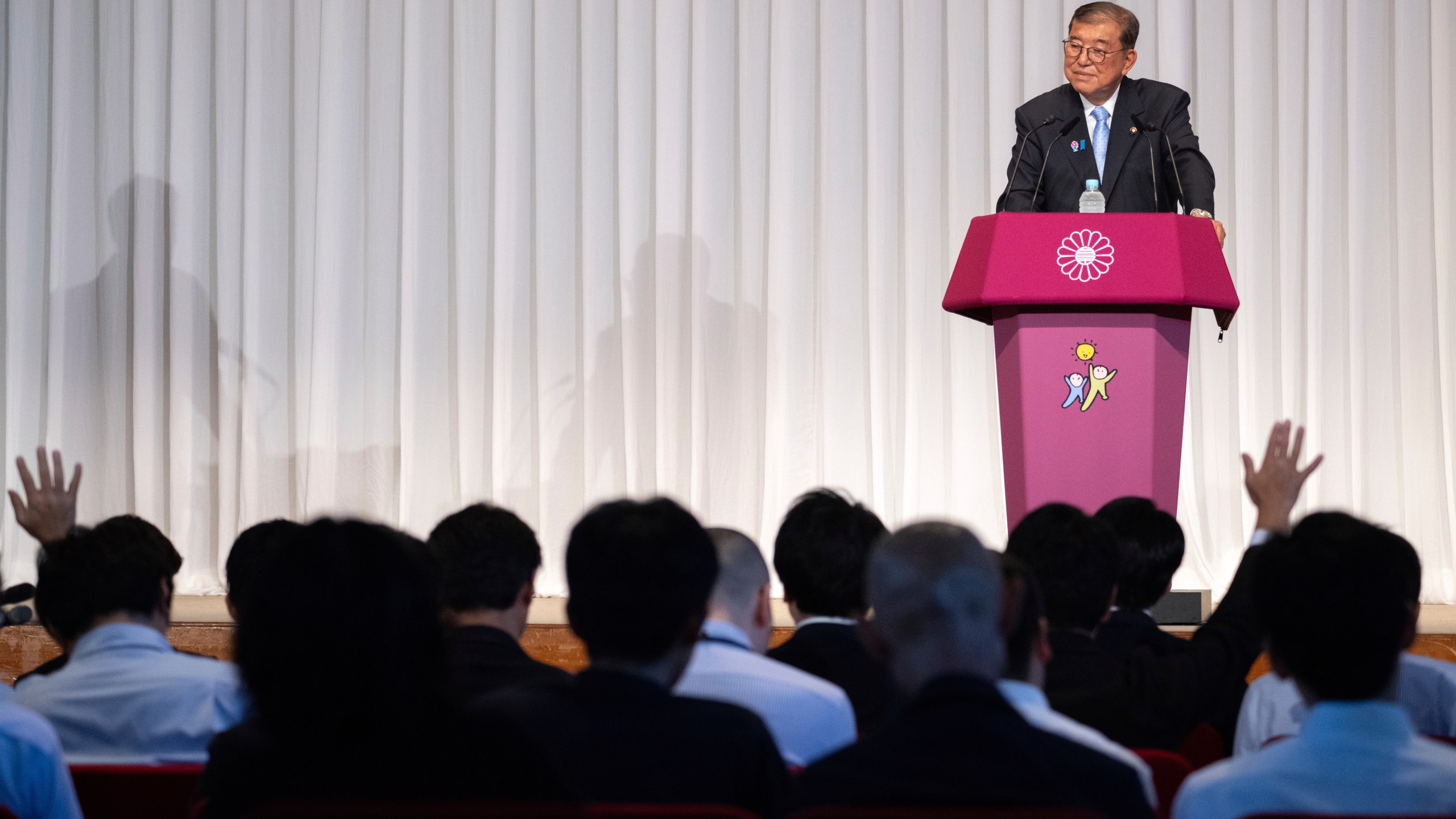 Japan's Prime Minister Shigeru Ishiba attends a press conference at the headquarters of the Liberal Democratic Party (LDP) in Tokyo Monday, July 21, 2025 after the prime minister's ruling coalition failed to secure a majority in the upper house in a parliamentary election. (Philip Fong/Pool Photo via AP)