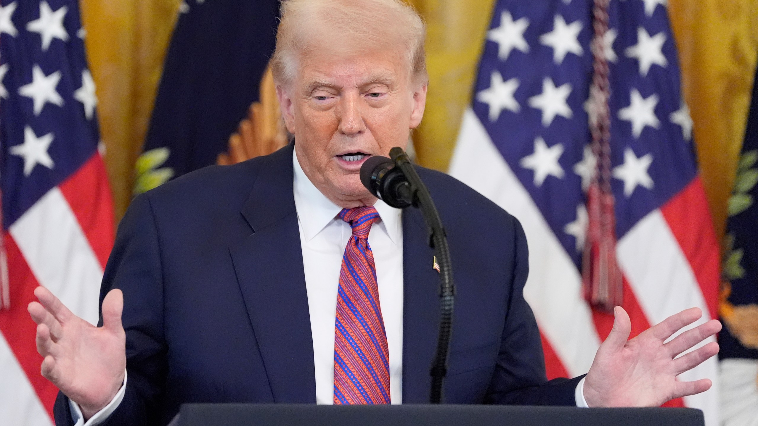 President Donald Trump speaks at an event for the signing of the GENIUS Act, a bill that regulates stablecoins, a type of cryptocurrency, in the East Room of the White House, Friday, July 18, 2025, in Washington. (AP Photo/Alex Brandon)