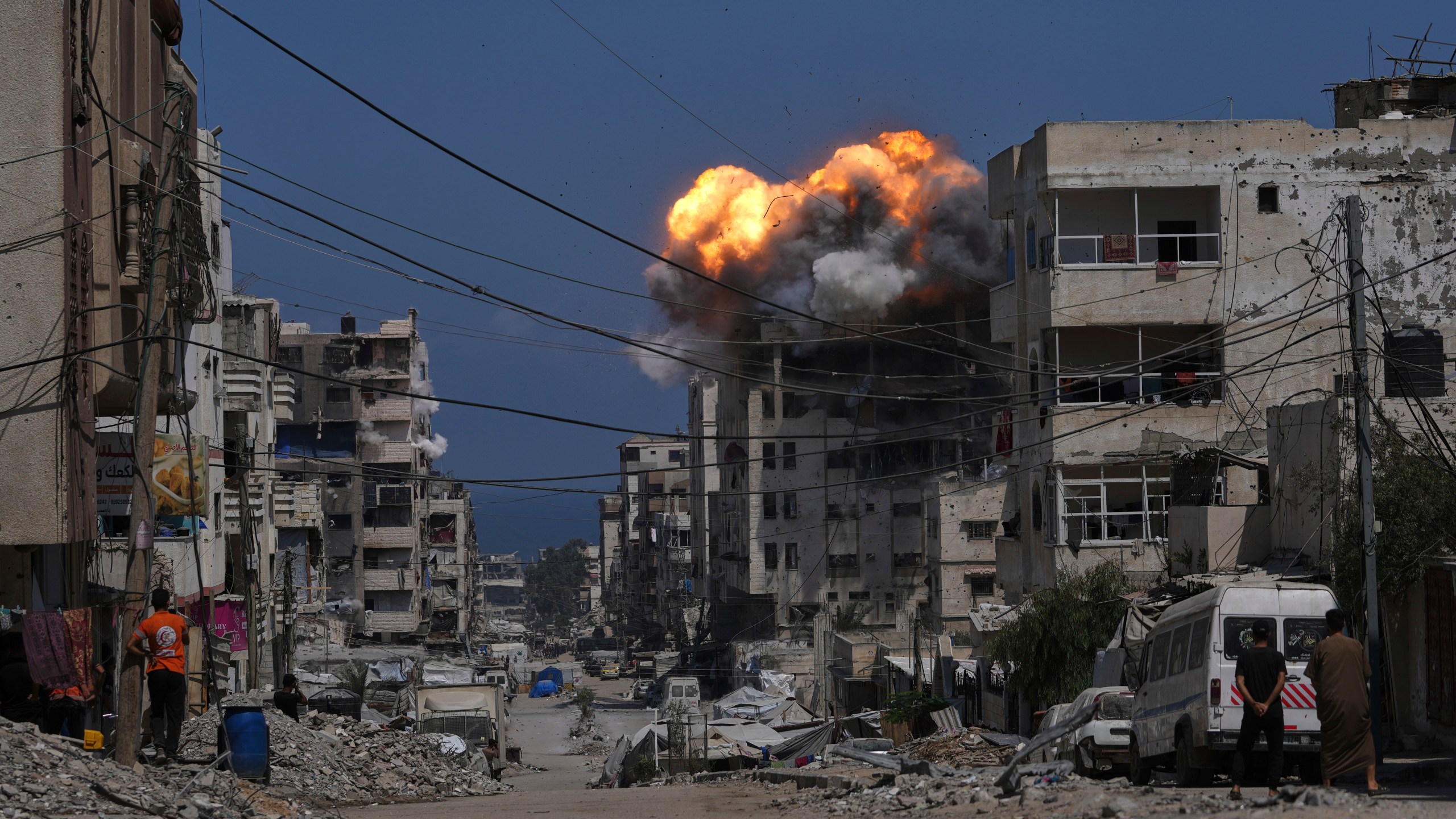 Smoke and flames erupt from an Israeli airstrike in Gaza City, Monday, July 21, 2025. (AP Photo/Jehad Alshrafi)