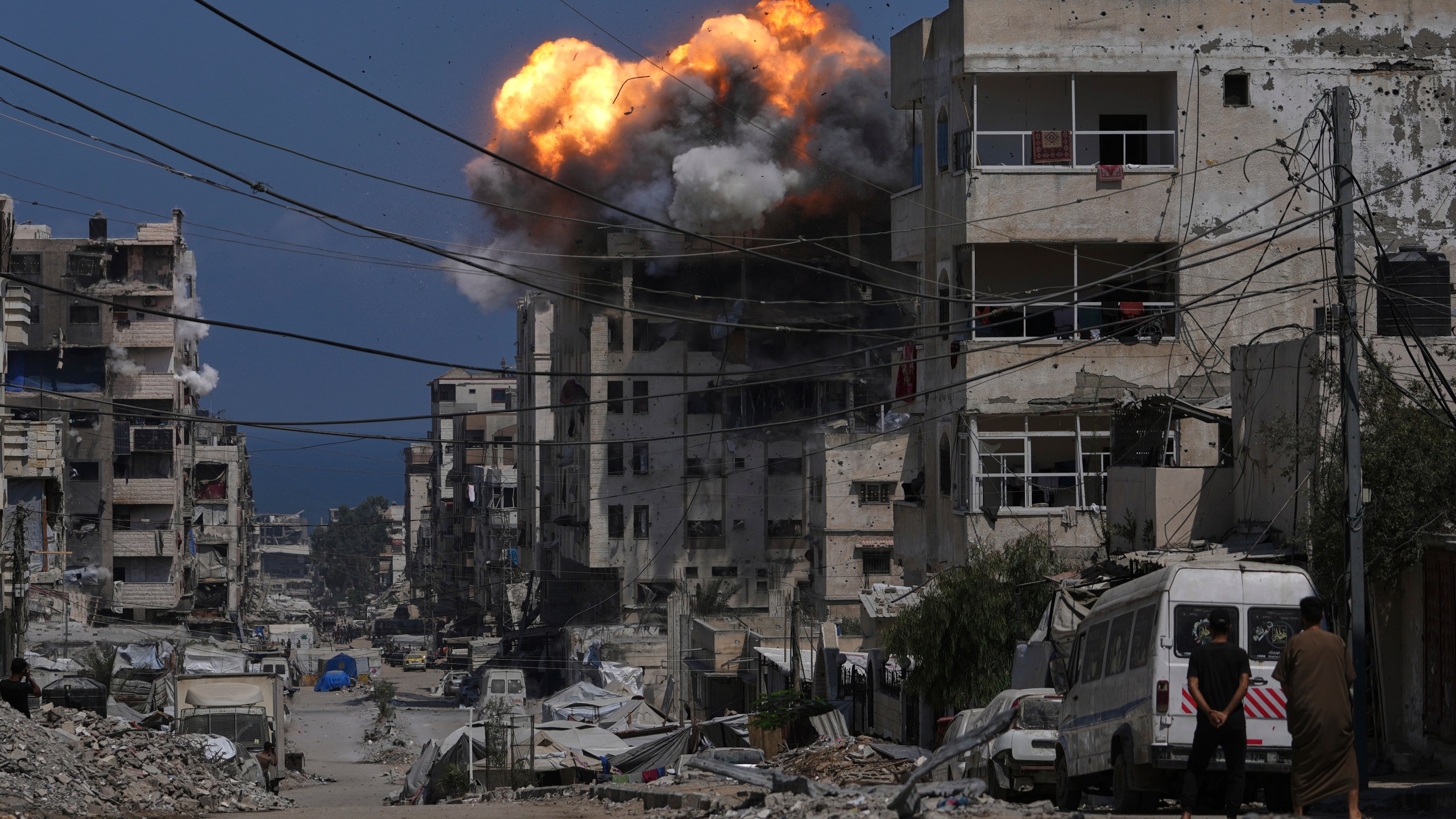 Smoke and flames erupt from an Israeli airstrike in Gaza City, Monday, July 21, 2025. (AP Photo/Jehad Alshrafi)