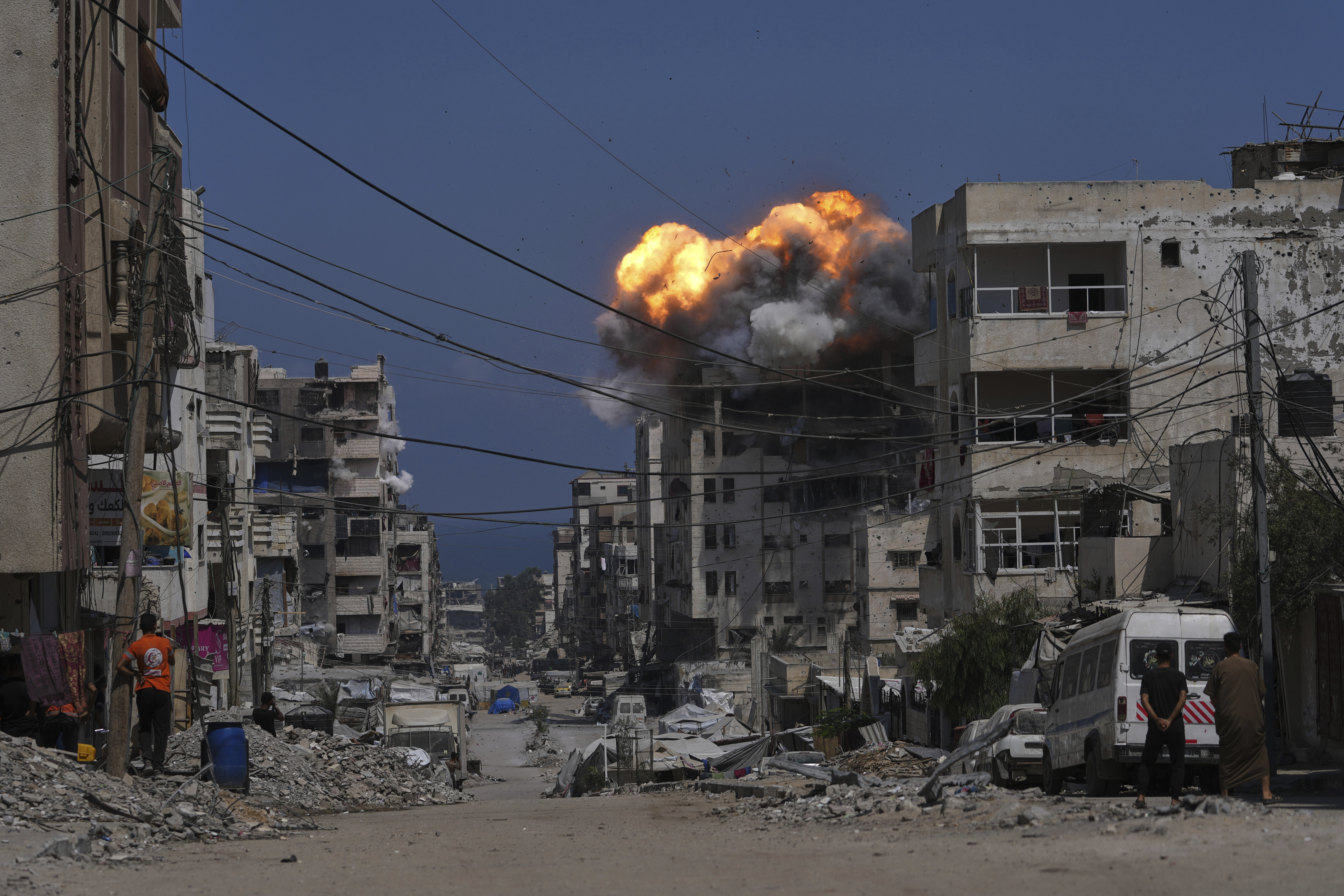 Smoke and flames erupt from an Israeli airstrike in Gaza City, Monday, July 21, 2025. (AP Photo/Jehad Alshrafi)