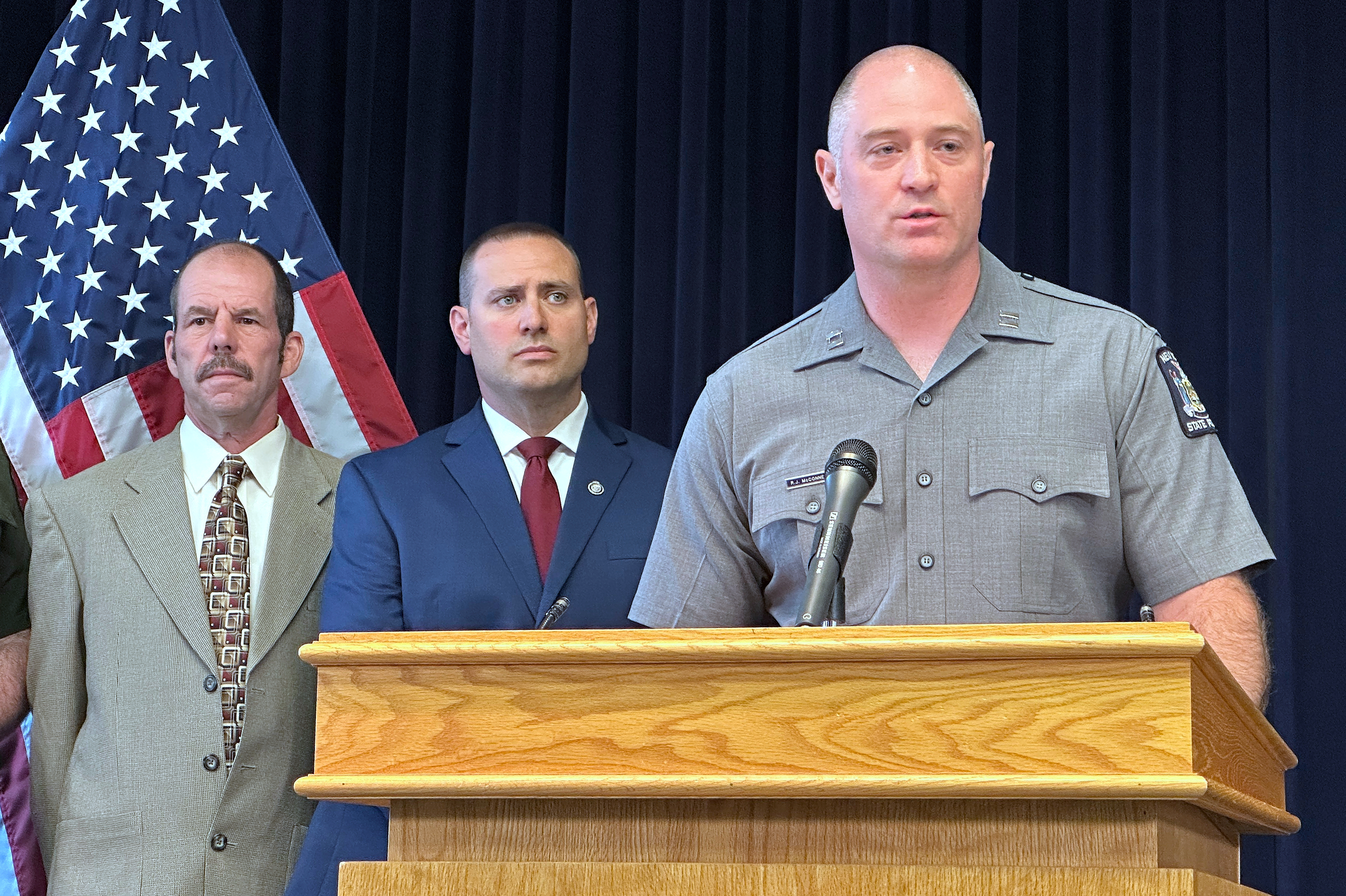 New York State Police Capt. Robert McConnell speaks at a news conference, Monday, July 21, 2025, in Latham, N.Y., about the arrest of a Canadian man who reported his 9-year-old daughter missing in upstate New York. (Associated Press/Michael Hill)