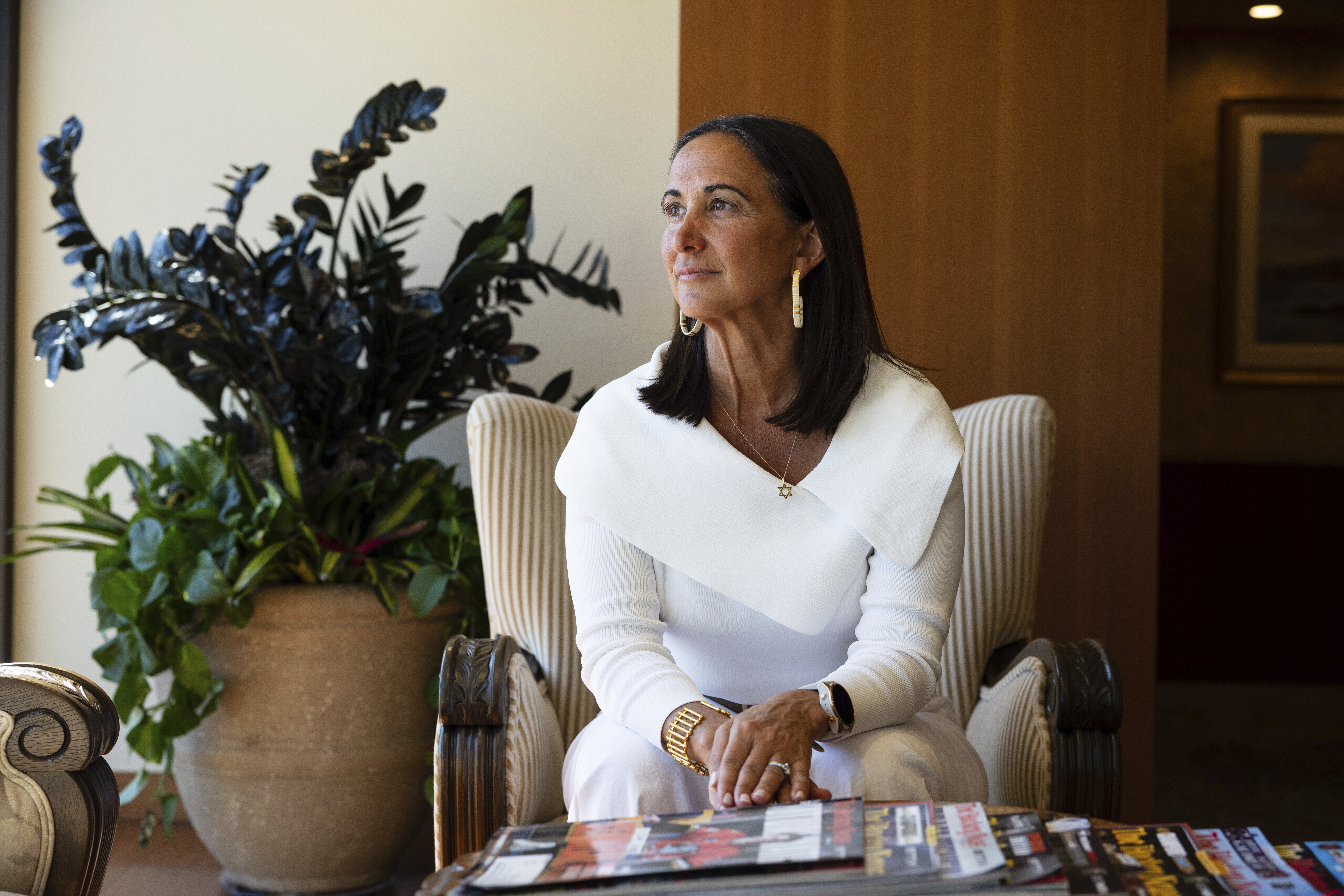 President of Samueli Family Philanthropies Lindsey Spindle sits outside of her office in Corona Del Mar, Calif., Monday, July 7, 2025. (AP Photo/Zoë Meyers)