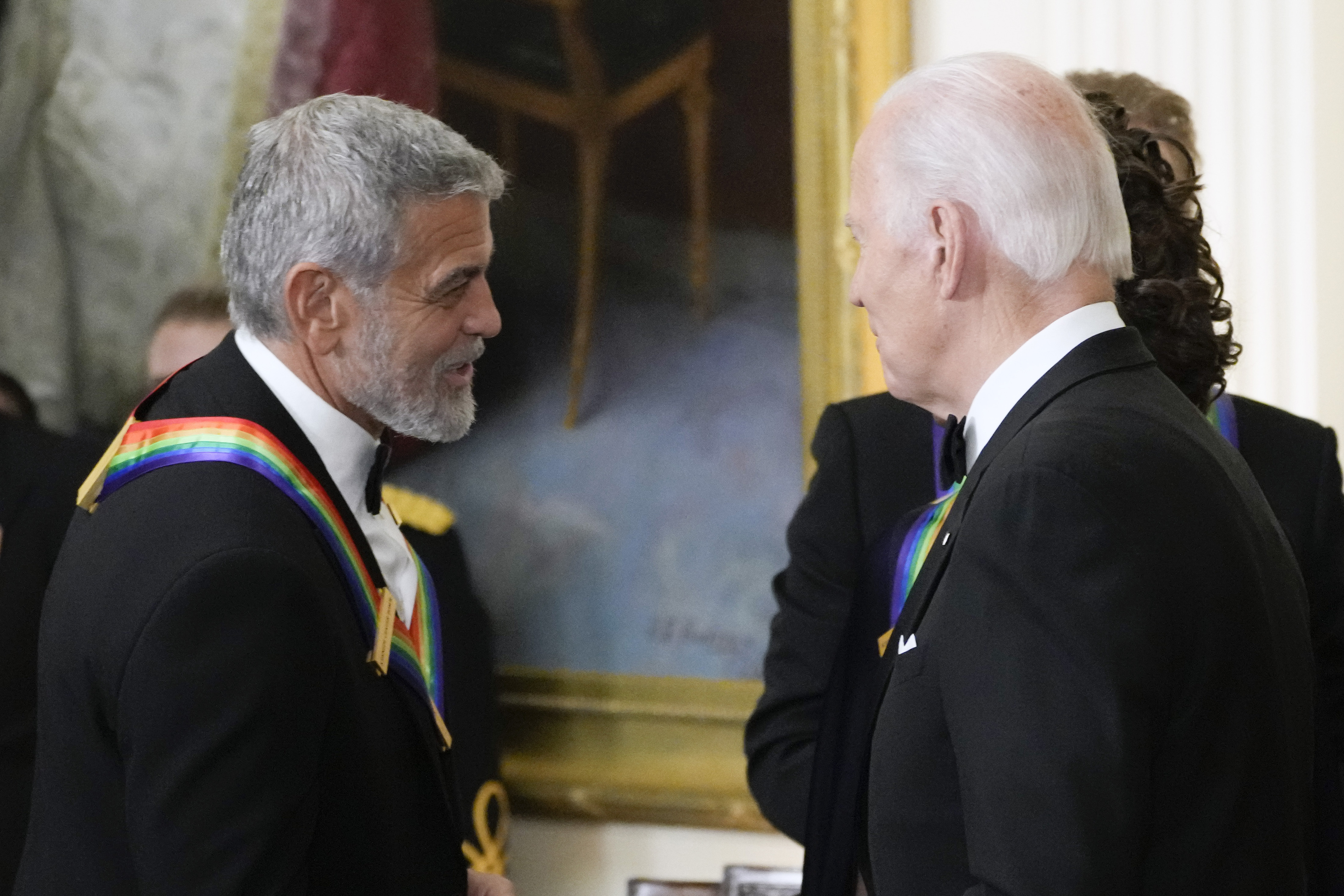 FILE - President Joe Biden shakes hands with actor, director and producer George Clooney during the Kennedy Center honorees reception at the White House in Washington, Dec. 4, 2022. (AP Photo/Manuel Balce Ceneta, File)