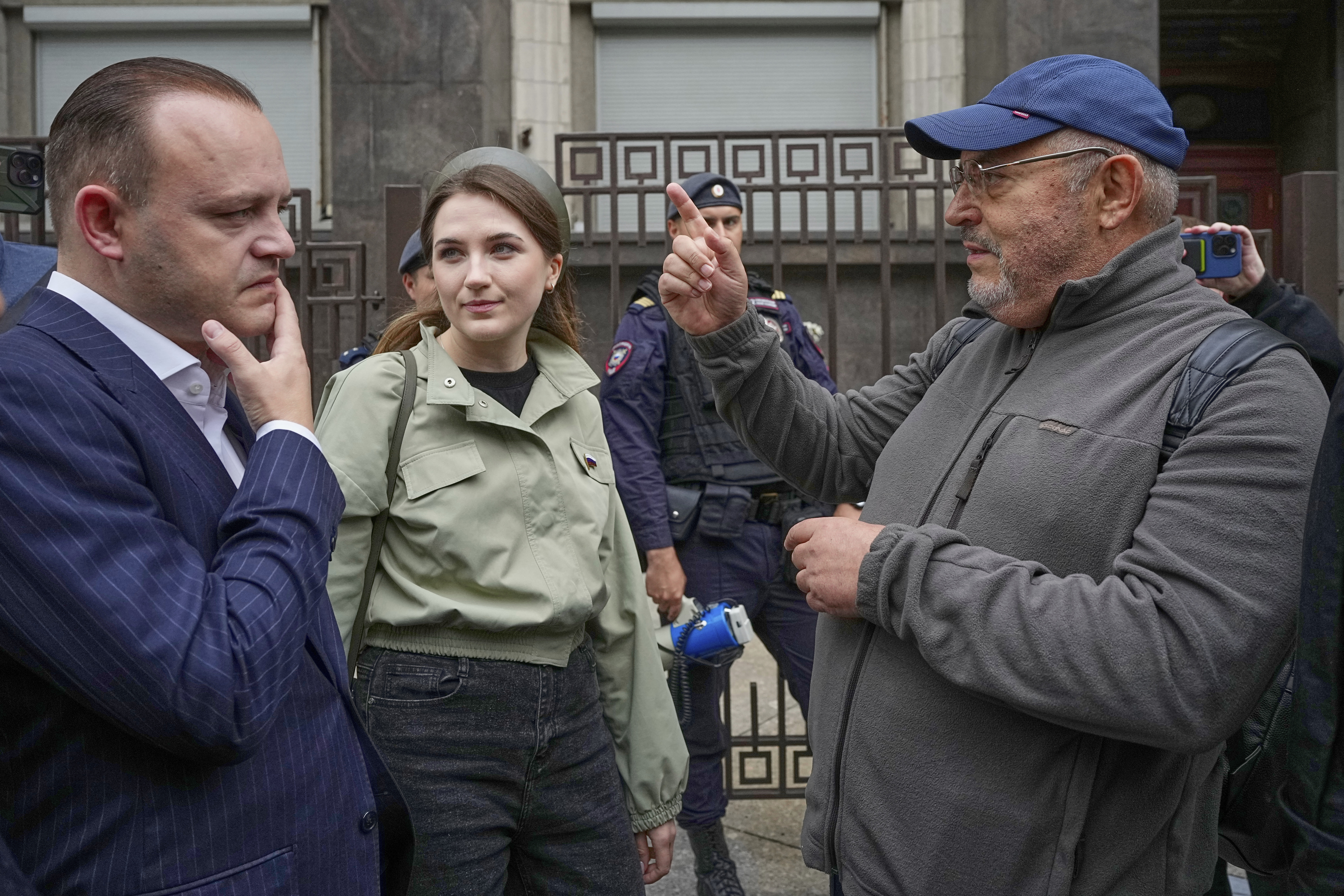 Russian politician Boris Nadezhdin, right, gestures while speaking to Vladislav Davankov, deputy chairman of the State Duma, the lower house of the Russian parliament, in Moscow, Russia, Tuesday, July 22, 2025, before lawmakers approved a bill that punishes online searches for information that is deemed “extremist.” (AP Photo/Alexander Zemlianichenko)