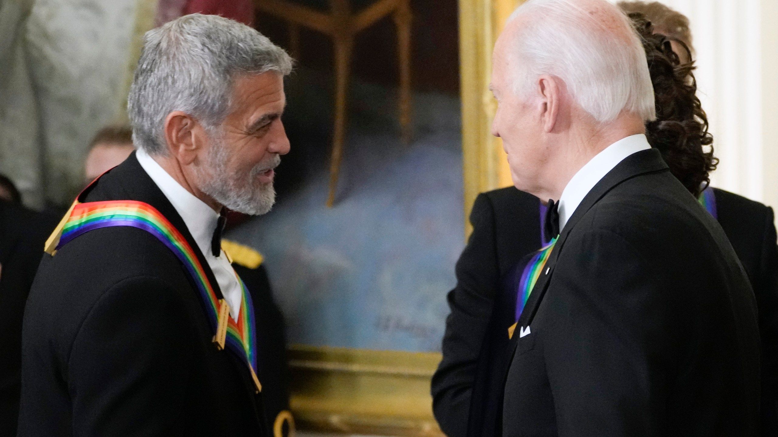 FILE - President Joe Biden shakes hands with actor, director and producer George Clooney during the Kennedy Center honorees reception at the White House in Washington, Dec. 4, 2022. (AP Photo/Manuel Balce Ceneta, File)