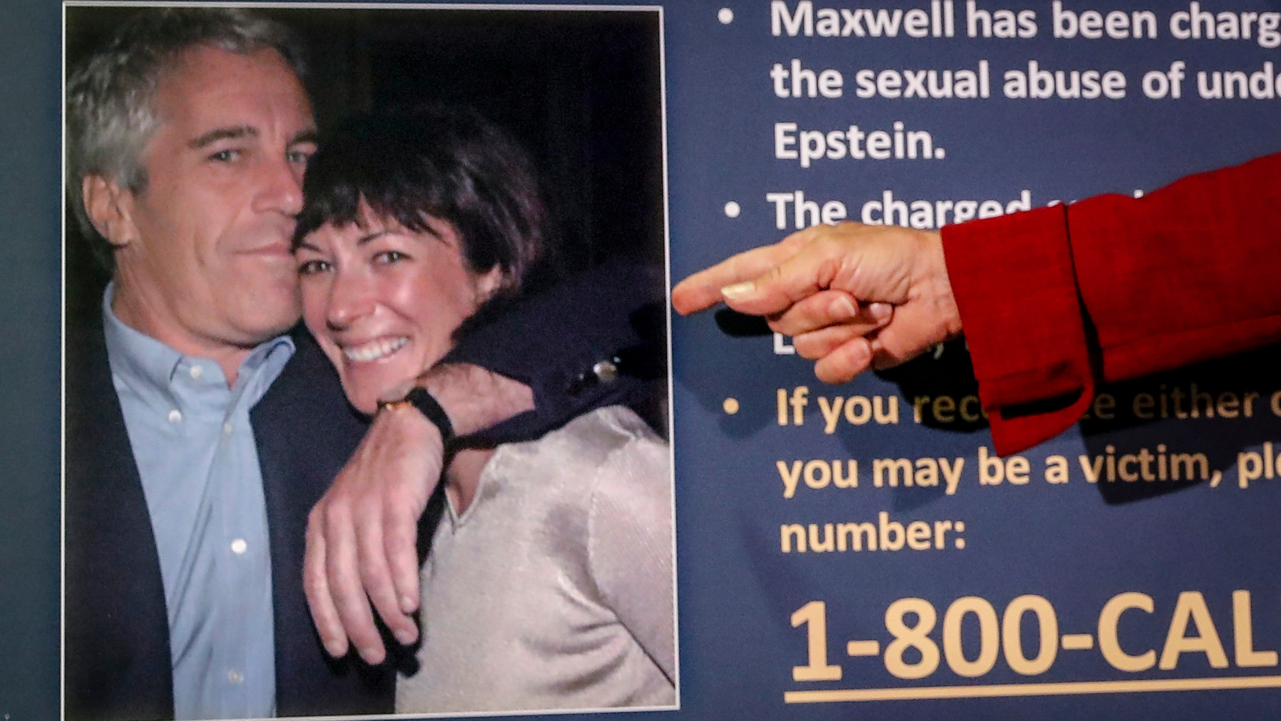 FILE - Audrey Strauss, acting U.S. attorney for the Southern District of New York, points to a photo of Jeffrey Epstein and Ghislaine Maxwell, during a news conference in New York on July 2, 2020. (AP Photo/John Minchillo, File)