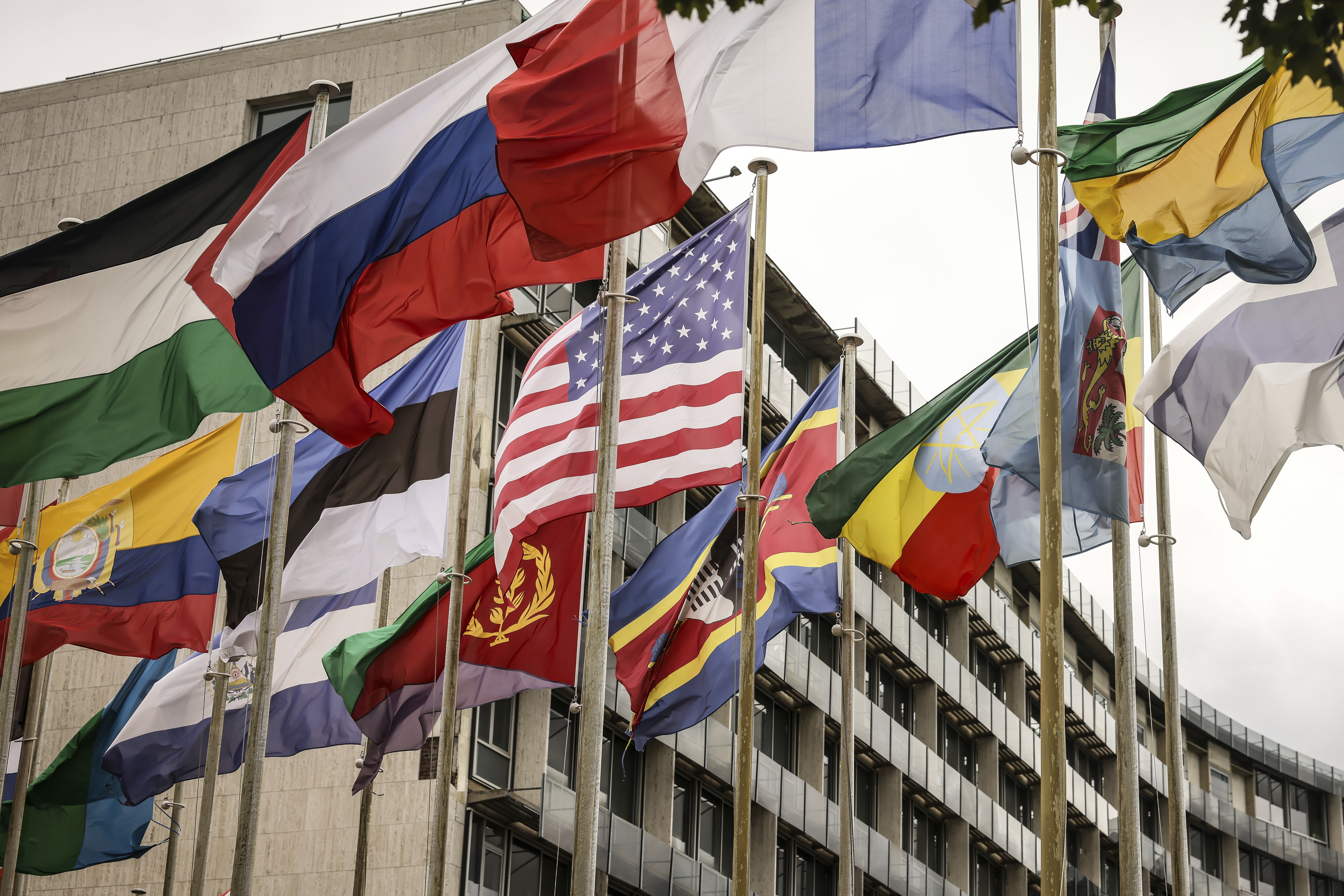 The U.S flag flies among others at the UNESCO headquarters Tuesday, July 22, 2025 in Paris. (AP Photo/Thomas Padilla)