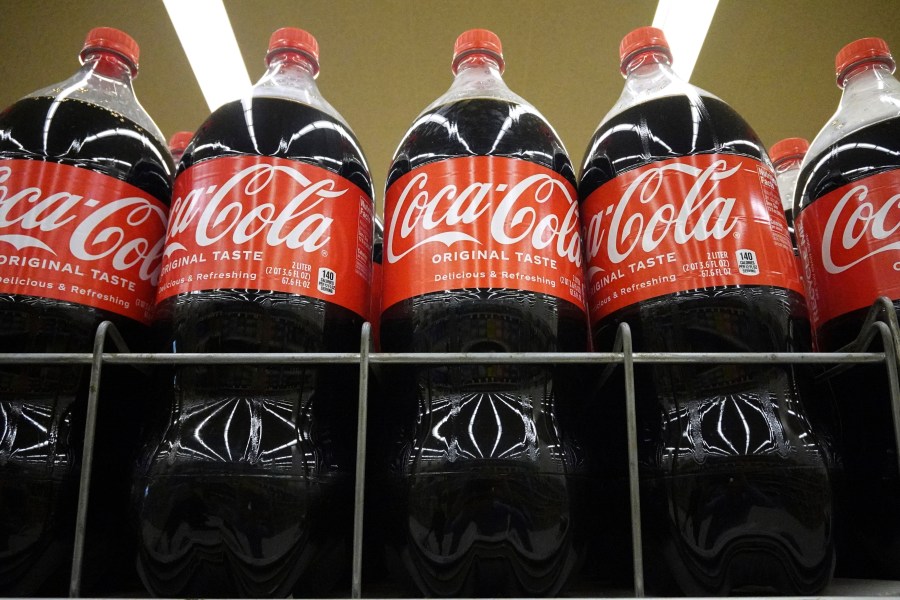 Bottles of Coca-Cola are displayed at a grocery store in Mount Prospect, Ill., Thursday, July 17, 2025. (AP Photo/Nam Y. Huh)