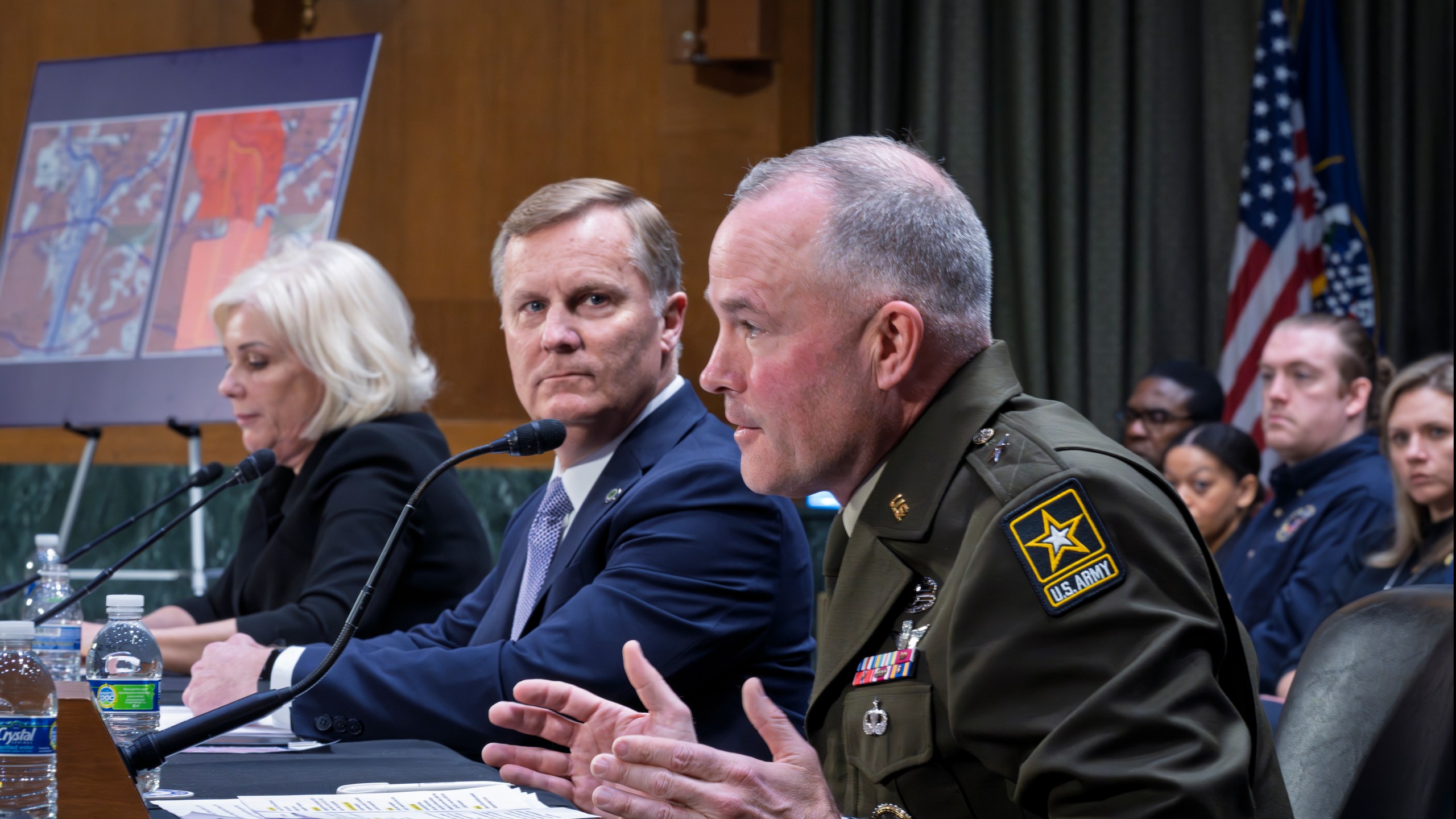 FILE - Brig. Gen. Matthew Braman, director of Army Aviation, center, answers questions, joined from left by Jennifer Homendy, chair of the National Transportation Safety Board, and Chris Rocheleau, acting administrator of the Federal Aviation Administration, as the Senate Transportation Subcommittee holds a hearing to examine the preliminary report by the National Transportation Safety Board on the Jan. 29, 2025, midair collision of an Army Black Hawk helicopter and an American Airlines regional jet, on Capitol Hill in Washington, March 27, 2025. (AP Photo/J. Scott Applewhite, File)