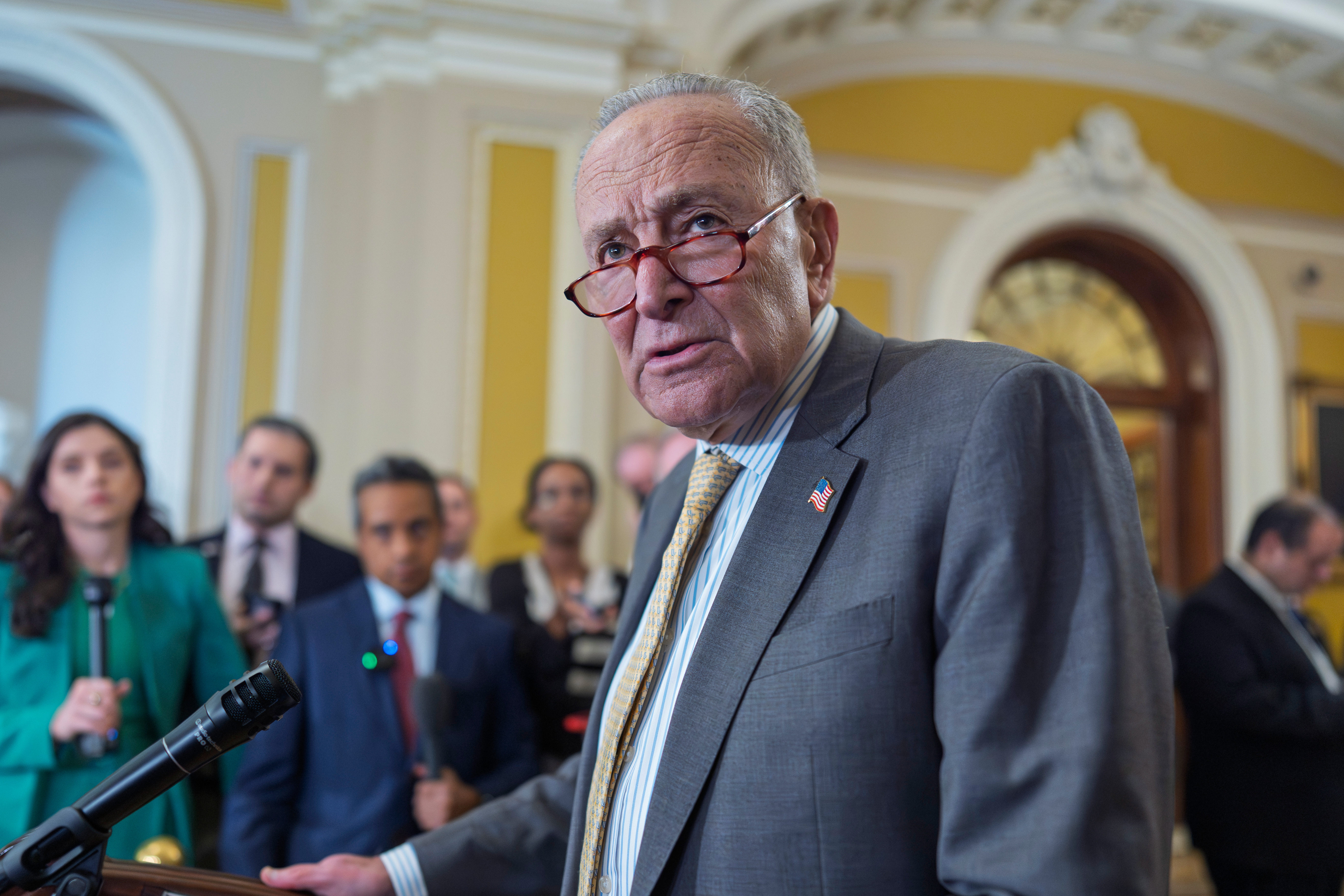 Senate Minority Leader Chuck Schumer, D-N.Y., speaks with reporters as the Senate holds its first procedural vote on Emil Bove's nomination for the 3rd Circuit Court of Appeals, at the Capitol in Washington, Tuesday, July 22, 2025. (AP Photo/J. Scott Applewhite)