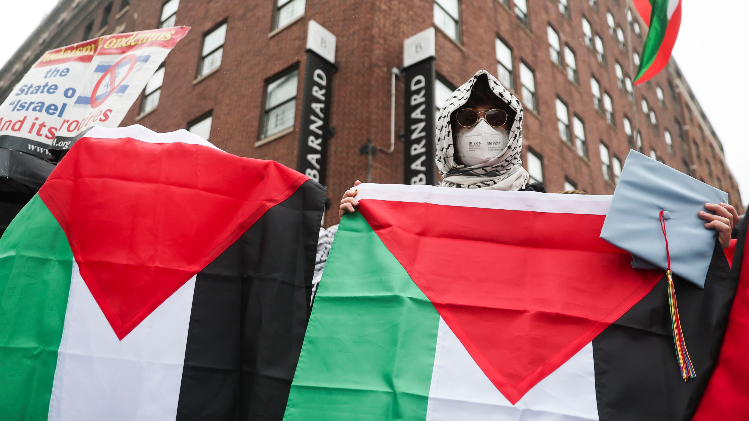 FILE - Protesters gather in support of Palestinians across the street from the main gates of Columbia University, May 21, 2025, in New York. (AP Photo/Heather Khalifa, File)