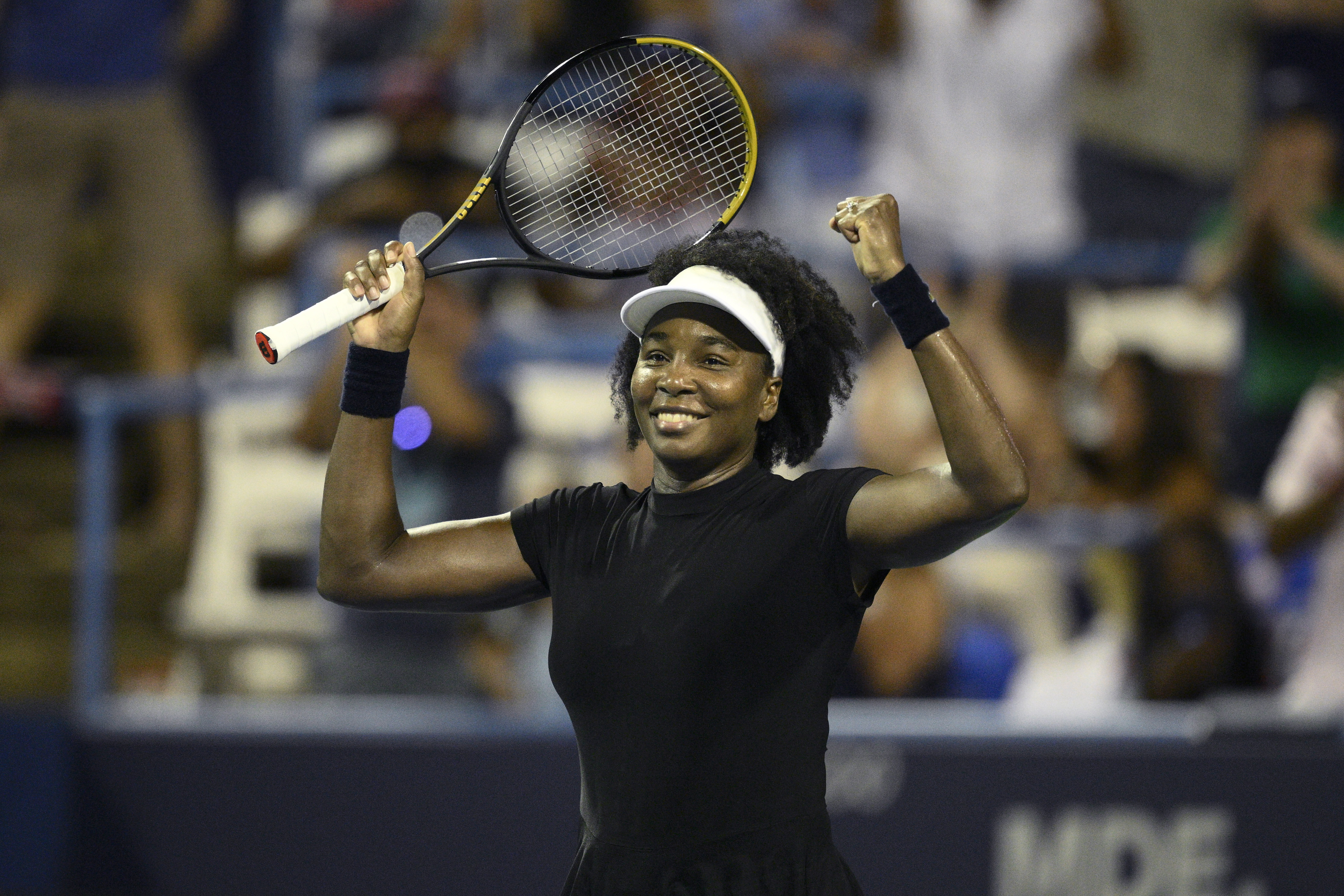 Venus Williams celebrates her win over Peyton Stearns during a match at the Citi Open tennis tournament Tuesday, July 22, 2025, in Washington. (AP Photo/Nick Wass)