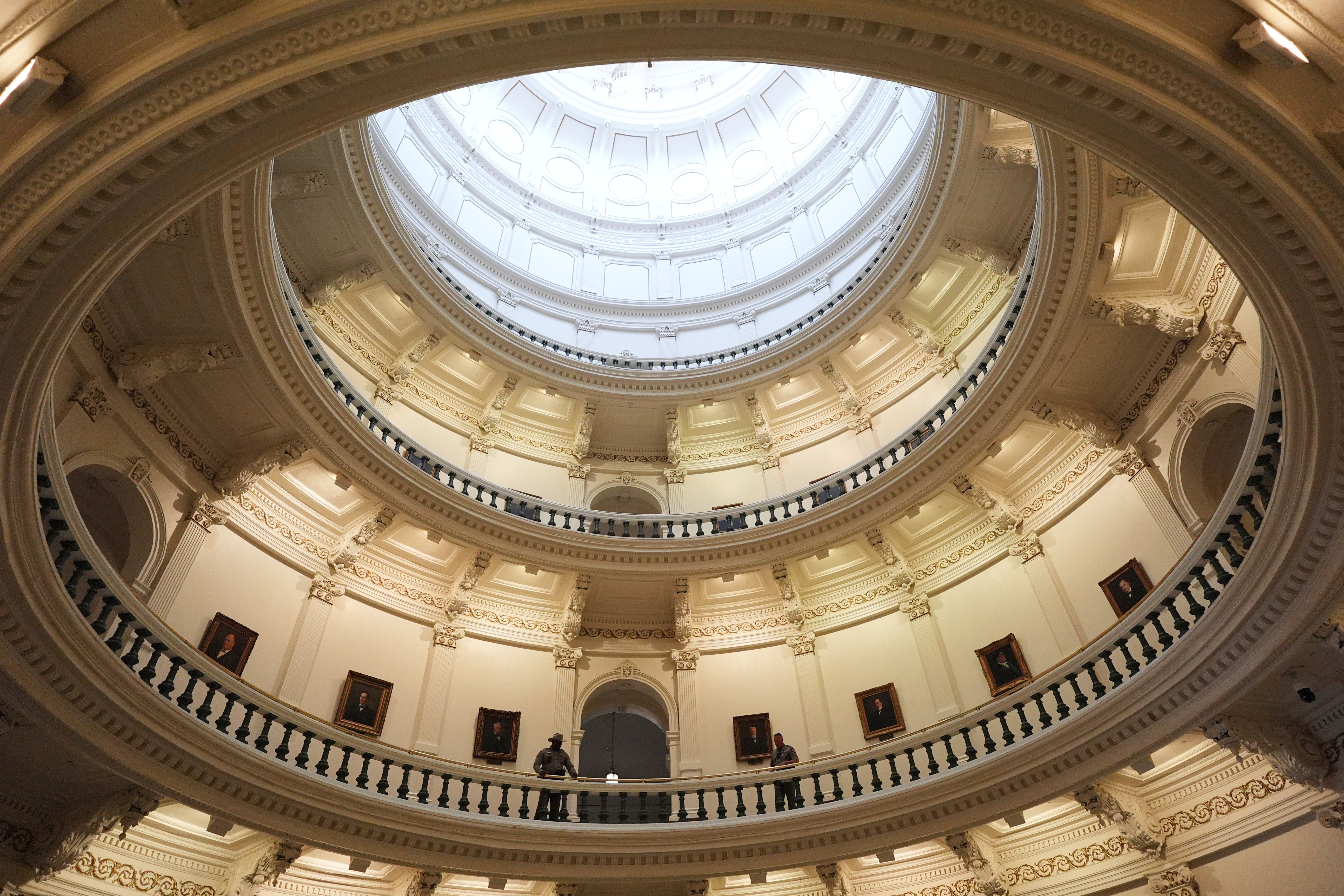 FILE - State troopers keep watch over the Rotunda at the Texas Capitol, July 21, 2025, in Austin. (AP Photo/Eric Gay, file)