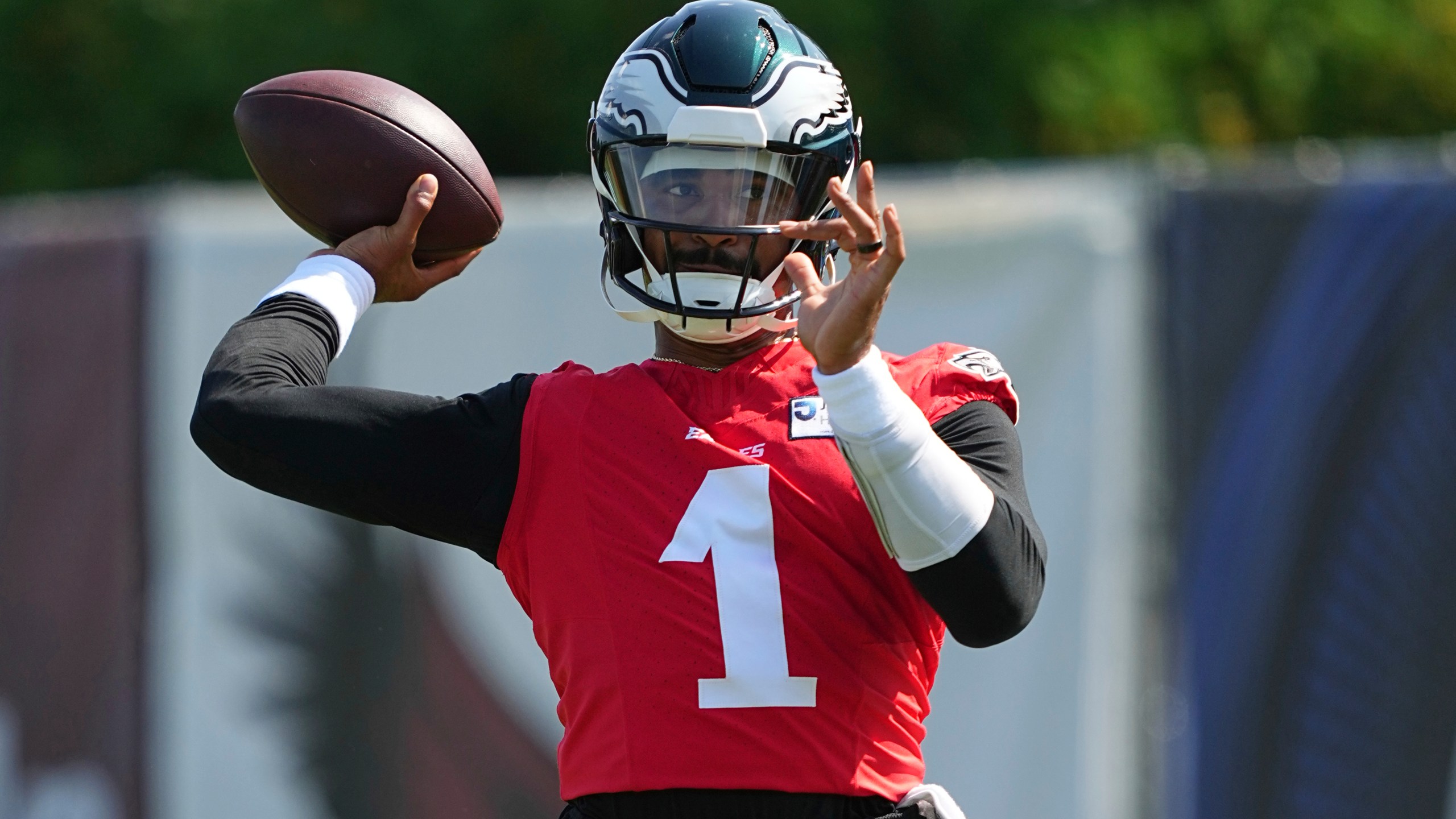 Philadelphia Eagles quarterback Jalen Hurts throws a pass during an NFL football training camp, Wednesday, July 23, 2025, in Philadelphia. (AP Photo/Matt Rourke)