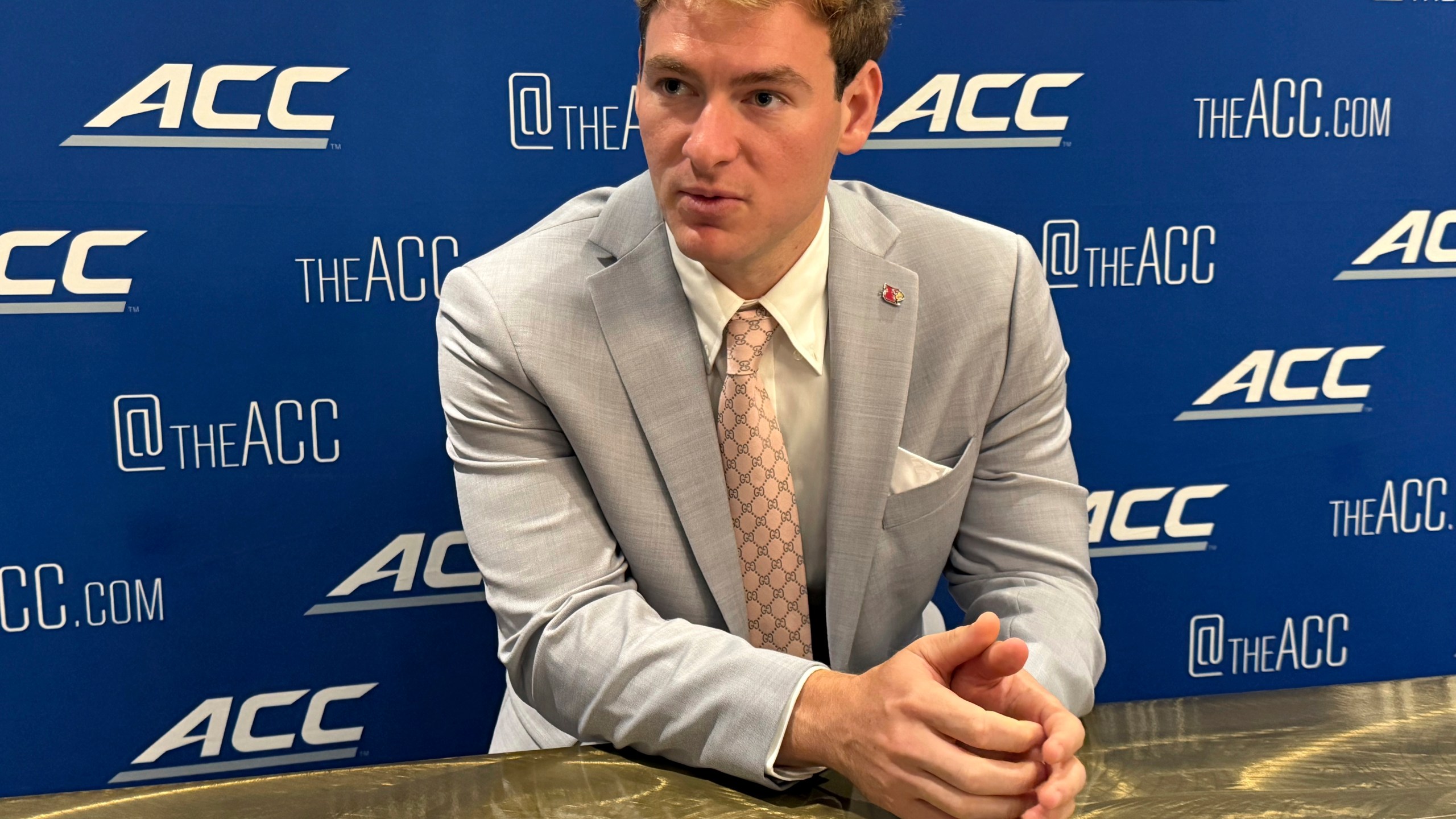 Louisville quarterback Miller Moss, a transfer from Southern California, speaks at the Atlantic Coast Conference NCAA college football media days, Wednesda, July 23, 2025, in Charlotte, N.C. (AP Photo/Steve Reed)