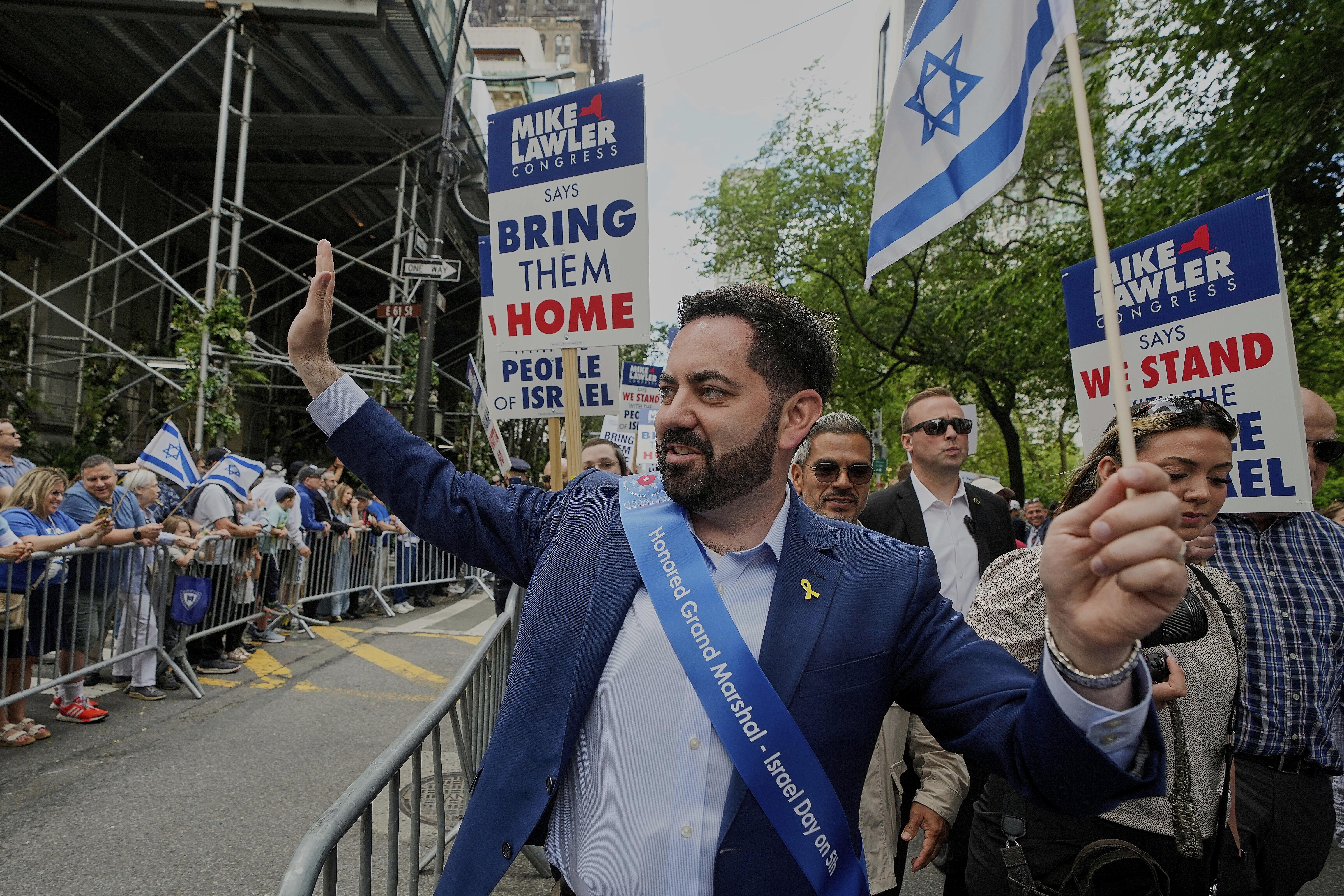 FILE — U.S. Rep. Mike Lawler, of New York's 17th District, marches in the 2025 Israel Day Parade, on New York's Fifth Avenue, May 18, 2025. (AP Photo/Richard Drew, File)