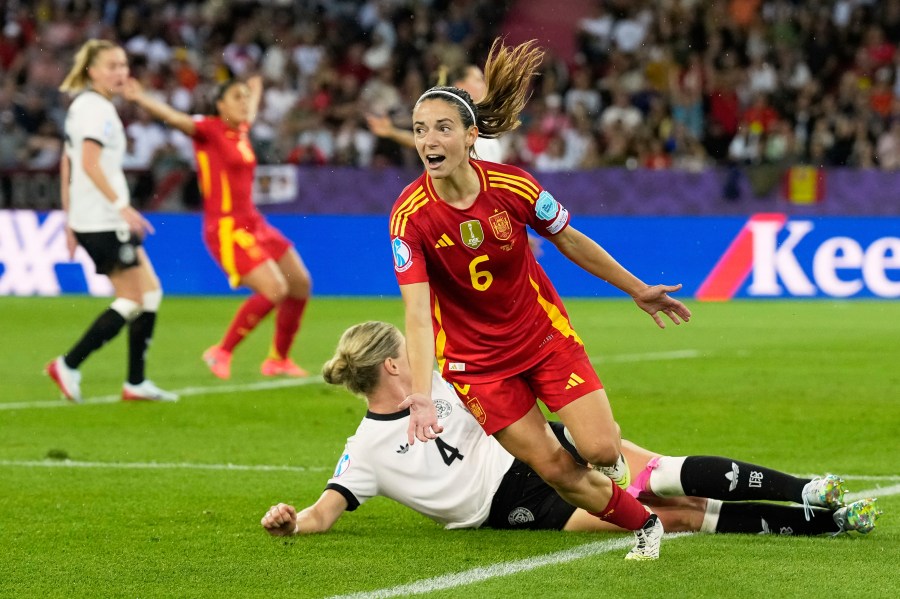 Spain's Aitana Bonmati celebrates after scoring the opening goal during the Women's Euro 2025 semifinals soccer match between Germany and Spain at Stadion Letzigrund in Zurich, Switzerland, Wednesday, July 23, 2025. (AP Photo/Alessandra Tarantino)