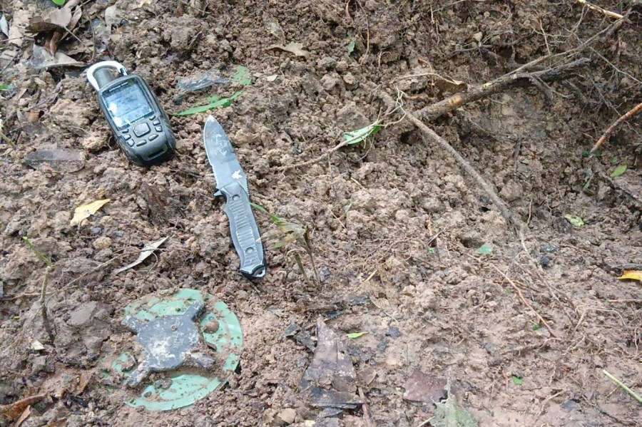 In this Sunday, July, 2025, photo released by the Royal Thai Army, Thai soldiers inspect a border area in Ubon Ratchathani†province where the Royal Thai Army said two anti-personnel landmines were found. (Royal Thai Army via AP)