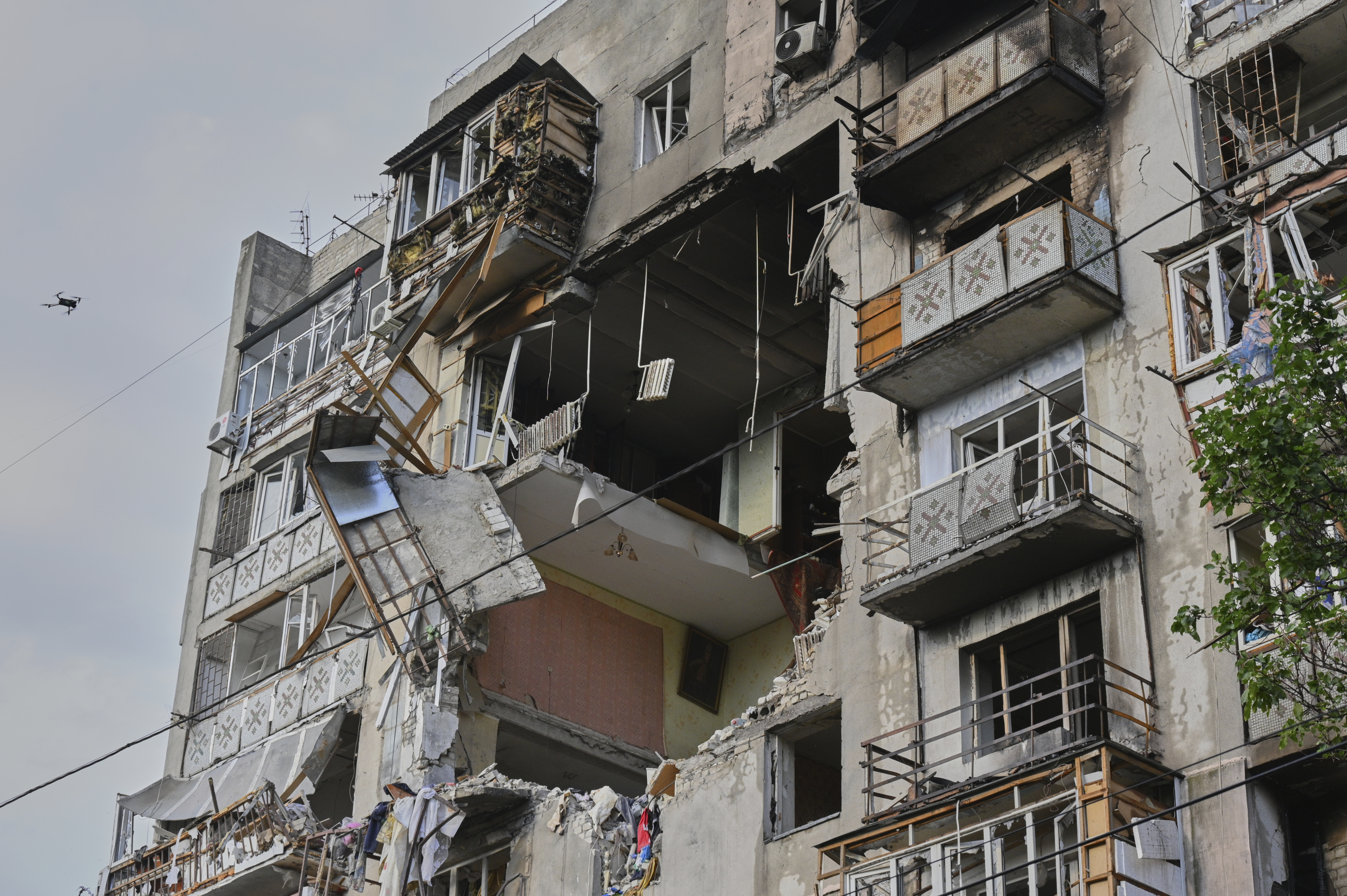 A residential building is damaged following Russia's drone attack in Odesa, Ukraine, Thursday, July 24, 2025. (AP Photo/Michael Shtekel)